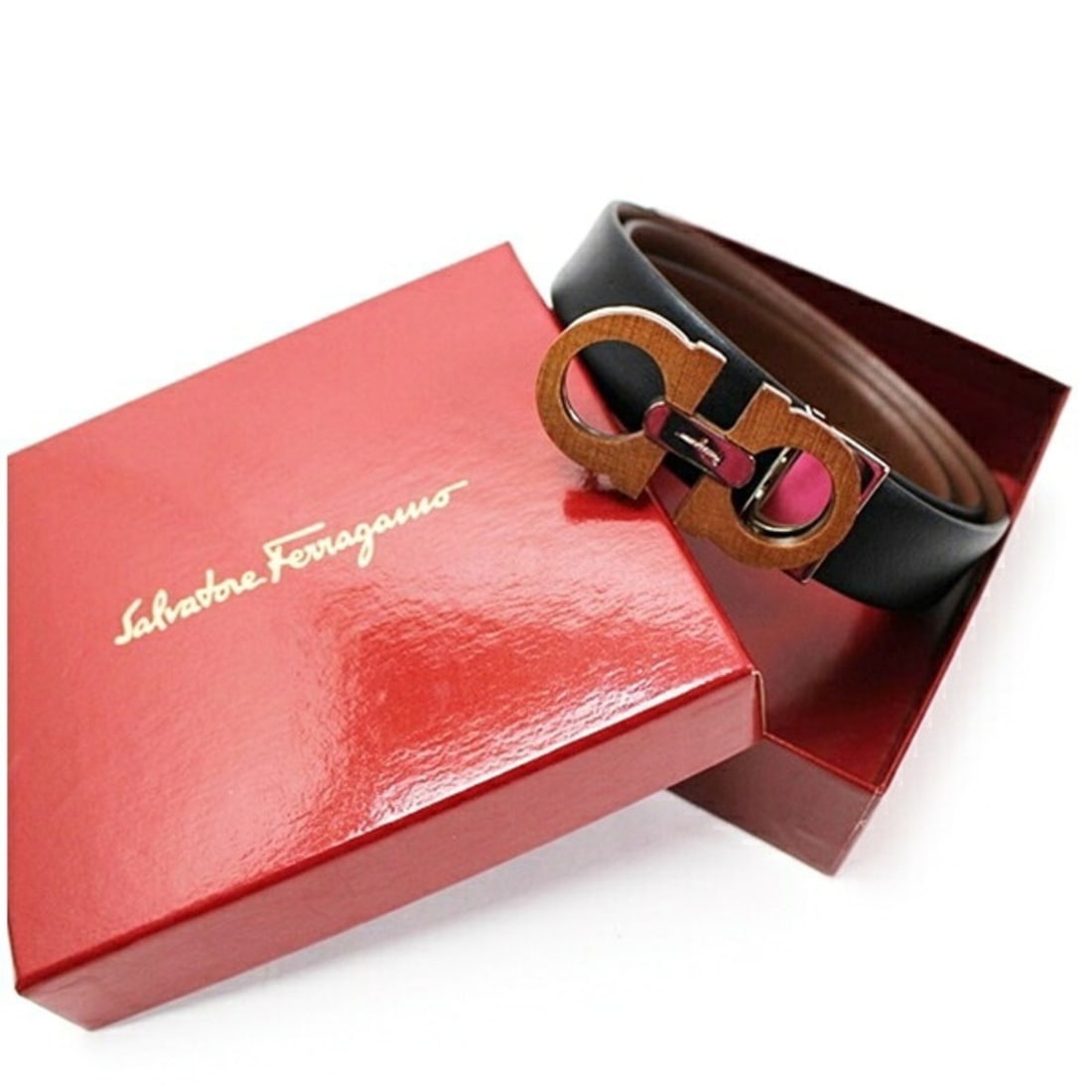 Ferragamo Gancini motif reversible leather belt, black and brown, total length 88.5 cm, waist 74-79: --- Catalog ---Category: SizeLength: 74cm - 79cm / 29.13'' - 31.1''Category: DesignType: Standard beltColor: Black, BrownGender: Men,WomenMaterial (Strap): Leather Category: GeneralBrand: Salvatore Fe