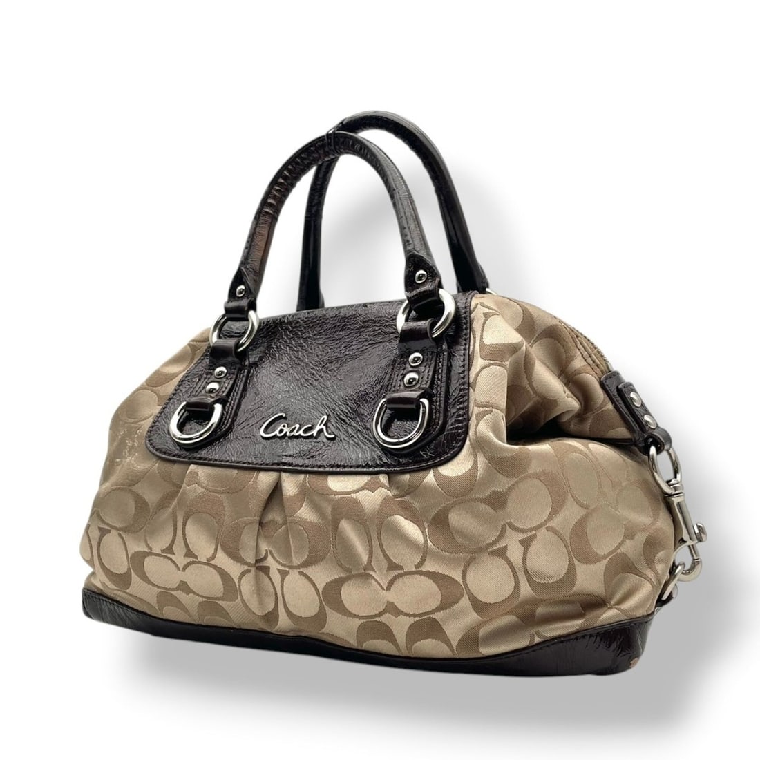 Coach Ashley Signature Satin Satchel Handbag Shoulder Bag Crossbody Beige Brown Silver Hardware: --- Catalog ---Category: SizeSize (HxWxD): 21cm x 30cm x 13cm / 8.26'' x 11.81'' x 5.11''Category: DesignType: Handbag, Shoulder bagColor: Beige, BrownGender: WomenMaterial: Canvas , Leather Category: