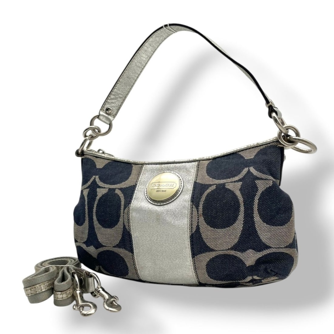 Coach Signature Stripe Demi Crossbody Shoulder Bag Handbag Canvas Leather Navy Silver Metallic: --- Catalog ---Category: SizeSize (HxWxD): 15cm x 26cm x 7cm / 5.9'' x 10.23'' x 2.75''Category: DesignType: Handbag, Shoulder bagColor: Navy, SilverGender: WomenMaterial: Canvas , Leather Category: G