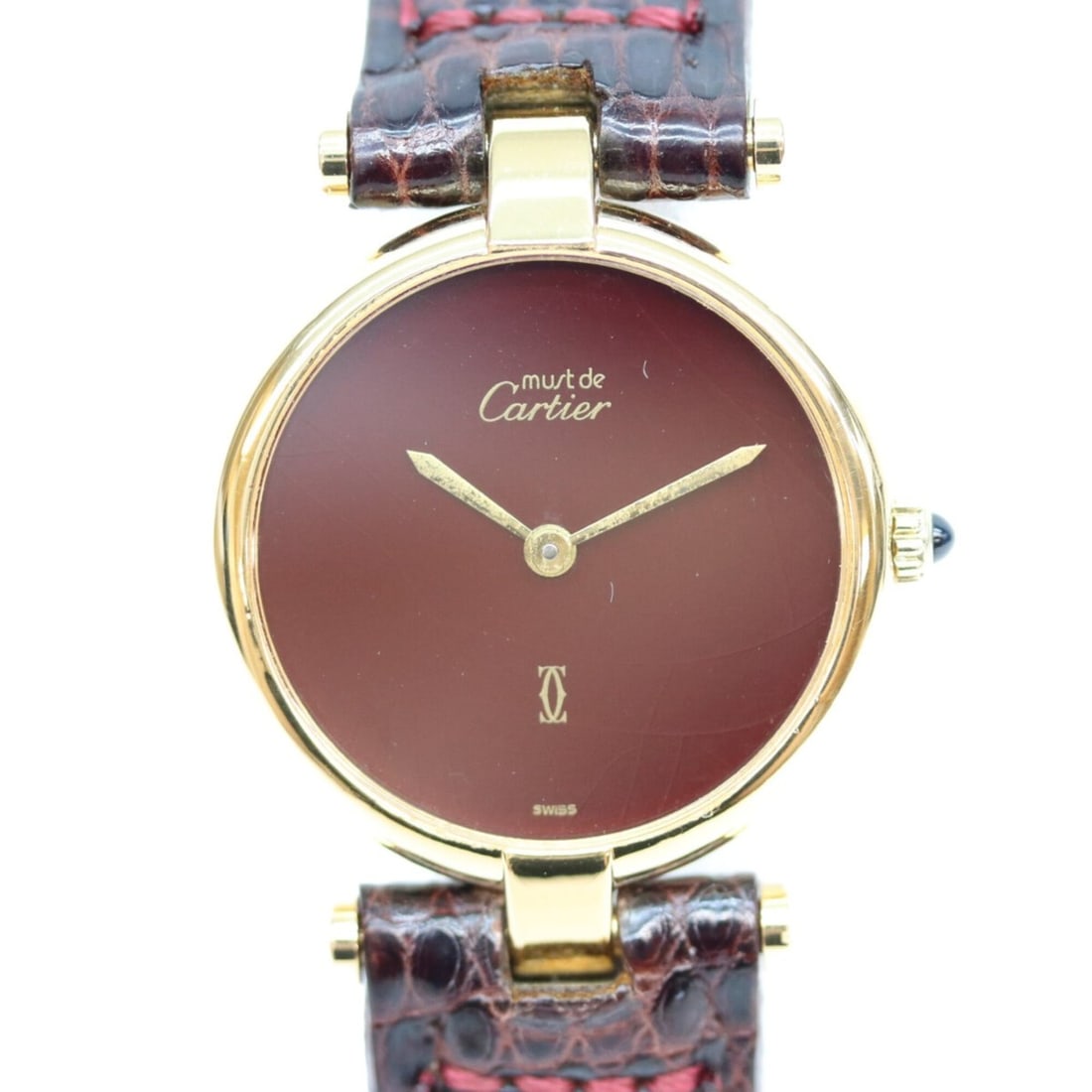 Cartier 925 Garnet Dial Bordeaux Must Vendome SM Vermeil Quartz Watch Gold Red Ladies: --- Catalog ---Category: SizeWrist Size: 13cm - 17cm / 5.11'' - 6.69''Case Diameter: 22mm / 0.87''Category: DesignType: WristwatchGender: WomenColor (Band): Red colorMaterial (Case): Silver 925Categor