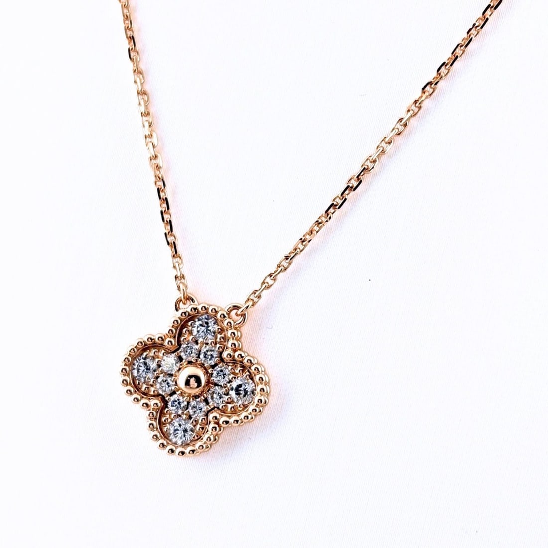 Van Cleef & Arpels Vintage Alhambra PG Pink Gold Pendant Necklace with Small Diamonds (750) -: --- Catalog ---Category: SizePendant Size: 14.7mm x 14.6mm / 0.57'' x 0.57''Neck Circumference: 42 cm / 16.53''Category: DesignStone: DiamondGender: WomenMaterial: Pink gold (18K)Necklace Type: Neckla