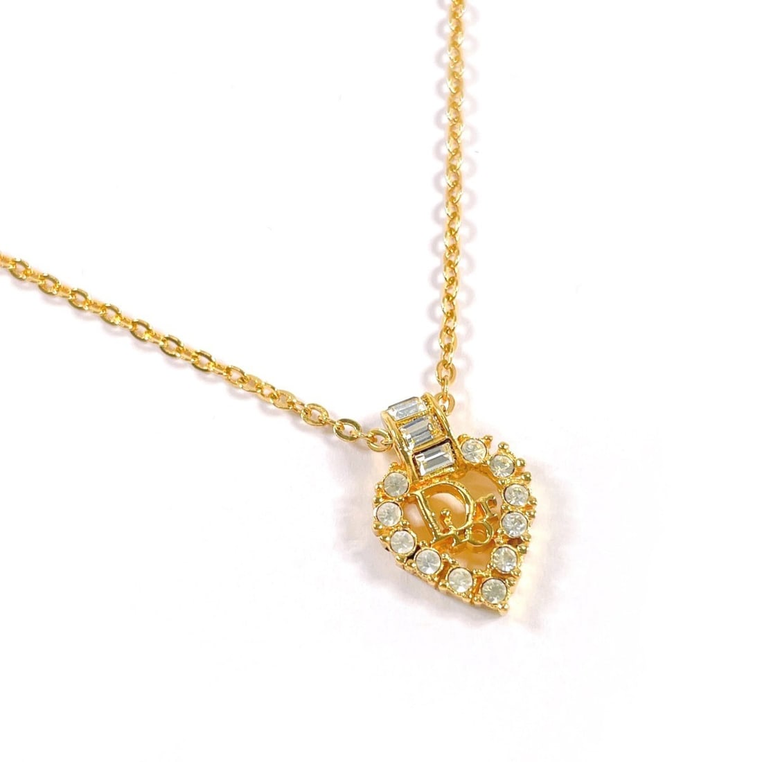 Christian Dior Heart Logo Vintage Necklace GP/Rhinestone Gold Women's: --- Catalog ---Category: SizePendant Size: 18mm x 12.8mm / 0.7'' x 0.5''Neck Circumference: 45 cm / 17.71''Category: DesignColor: GoldGender: WomenMaterial: Gold plating, RhinestoneNecklace Type: Neck