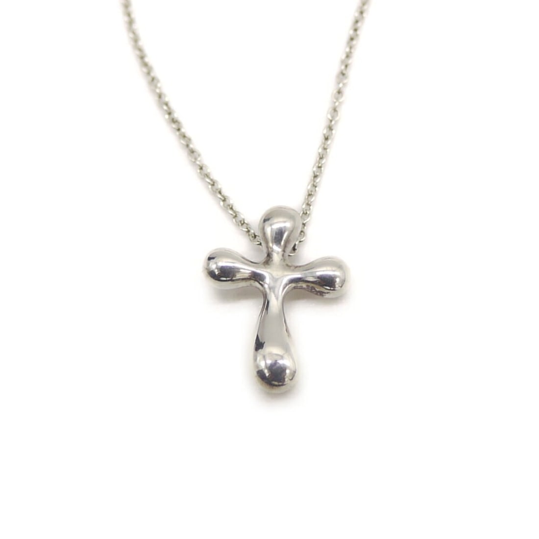 TIFFANY & Co. Tiffany Elsa Peretti Small Cross Pendant Necklace, Sterling Silver 925, Cable Chain: --- Catalog ---Category: SizePendant Size: 15.8mm x 11.8mm / 0.62'' x 0.46''Neck Circumference: 41 cm / 16.14''Category: DesignGender: WomenMaterial: Silver 925Necklace Type: Pendant necklaceCategory: