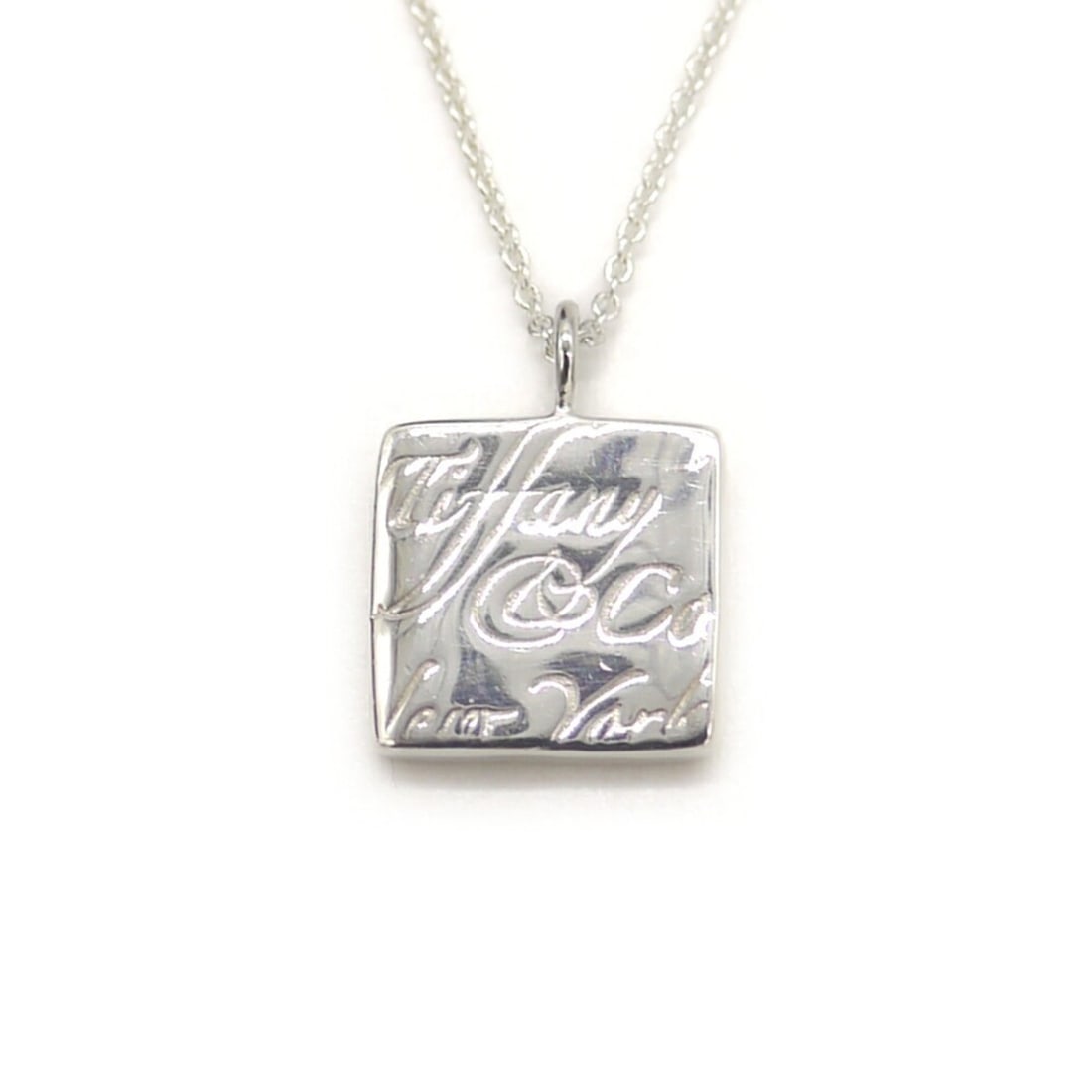 TIFFANY & Co. Tiffany Notes Square Plate Pendant Necklace, Sterling Silver 925, Figaro Chain: --- Catalog ---Category: SizePendant Size: 16.7mm x 12.4mm / 0.65'' x 0.48''Neck Circumference: 42 cm / 16.53''Category: DesignGender: WomenMaterial: Silver 925Necklace Type: Pendant necklaceCategory: