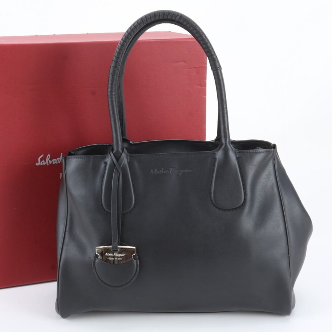 Salvatore Ferragamo Nolita Gancini Leather Tote Bag Shoulder Handbag for Women: --- Catalog ---Category: SizeSize (HxWxD): 24cm x 31cm x 12cm / 9.44'' x 12.2'' x 4.72''Category: DesignType: Handbag, Shoulder bag, Tote bagColor: BlackGender: WomenMaterial: Leather Category: Genera