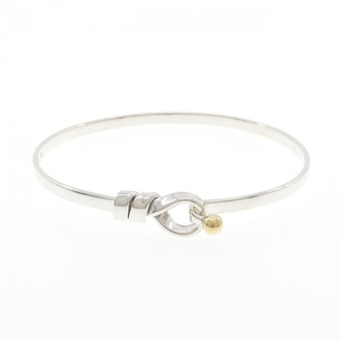 Tiffany Hook & Eye Bangle: --- Catalog ---Category: SizeLength: 17cm / 6.69''Category: DesignType: BangleGender: WomenMaterial: Silver 925, Yellow gold (18K)Category: GeneralBrand: Tiffany--- Item List ---Section: