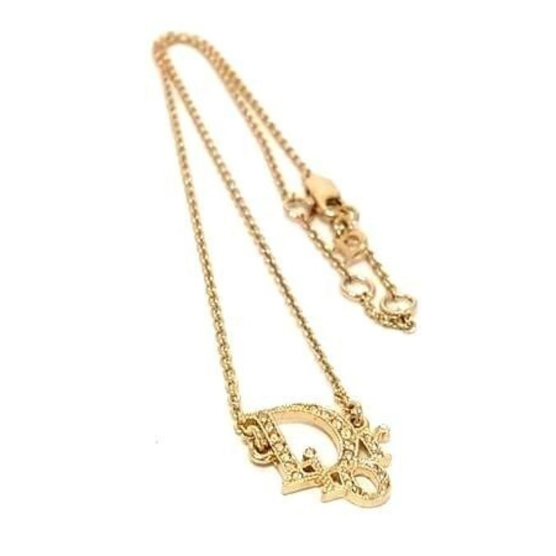 Christian Dior Gold Metal Rhinestone Necklace for Women: --- Catalog ---Category: SizePendant Size: 15mm x 15mm / 0.59'' x 0.59''Neck Circumference: 41 cm / 16.14''Category: DesignColor: GoldStone: RhinestoneStyle: Casual, FashionGender: WomenMaterial: Meta