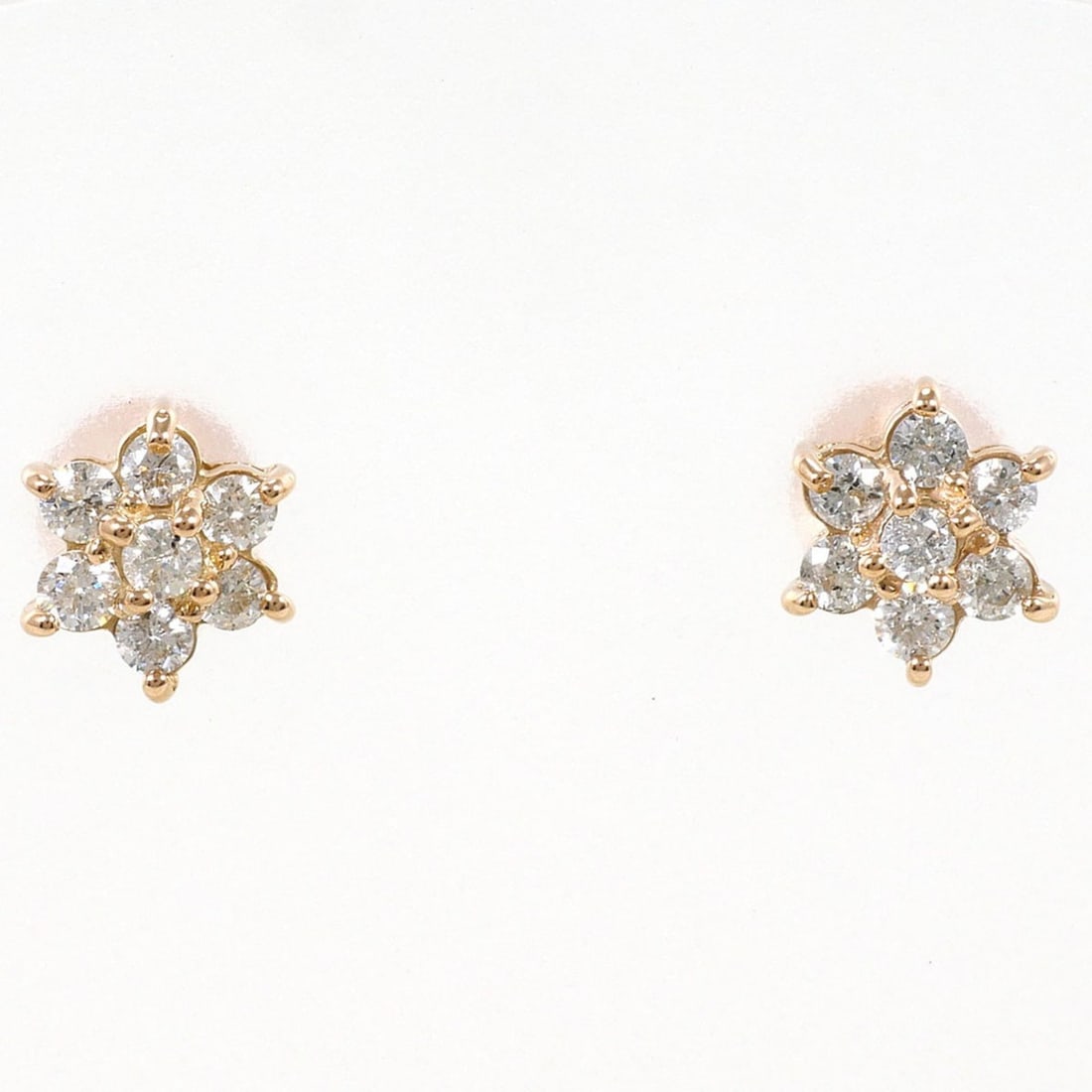 18K (18-karat gold) Pink Gold Earrings with 0.15ct Diamonds, Total Weight 0.6g, Jewelry: --- Catalog ---Category: SizeWeight: 0.6g / 0.02oz.Category: DesignType: Stud earringsColor: Pink goldMetal: GoldStone: DiamondGender: WomenMaterial: Pink gold (18K)Weight (ct.): 0.15Category: General