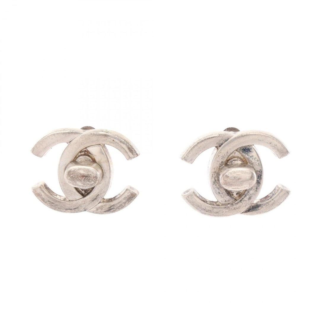 Chanel Coco Mark Turnlock Motif Earrings, Metal Jewelry, Women's, Silver Tone: --- Catalog ---Category: SizeSize (HxWxD): 20.00mm x 26.00mm / 0.79'' x 1.02''Category: DesignType: Clip earringsColor: SilverGender: WomenMaterial: MetalCategory: GeneralBrand: Chanel--- Item List --