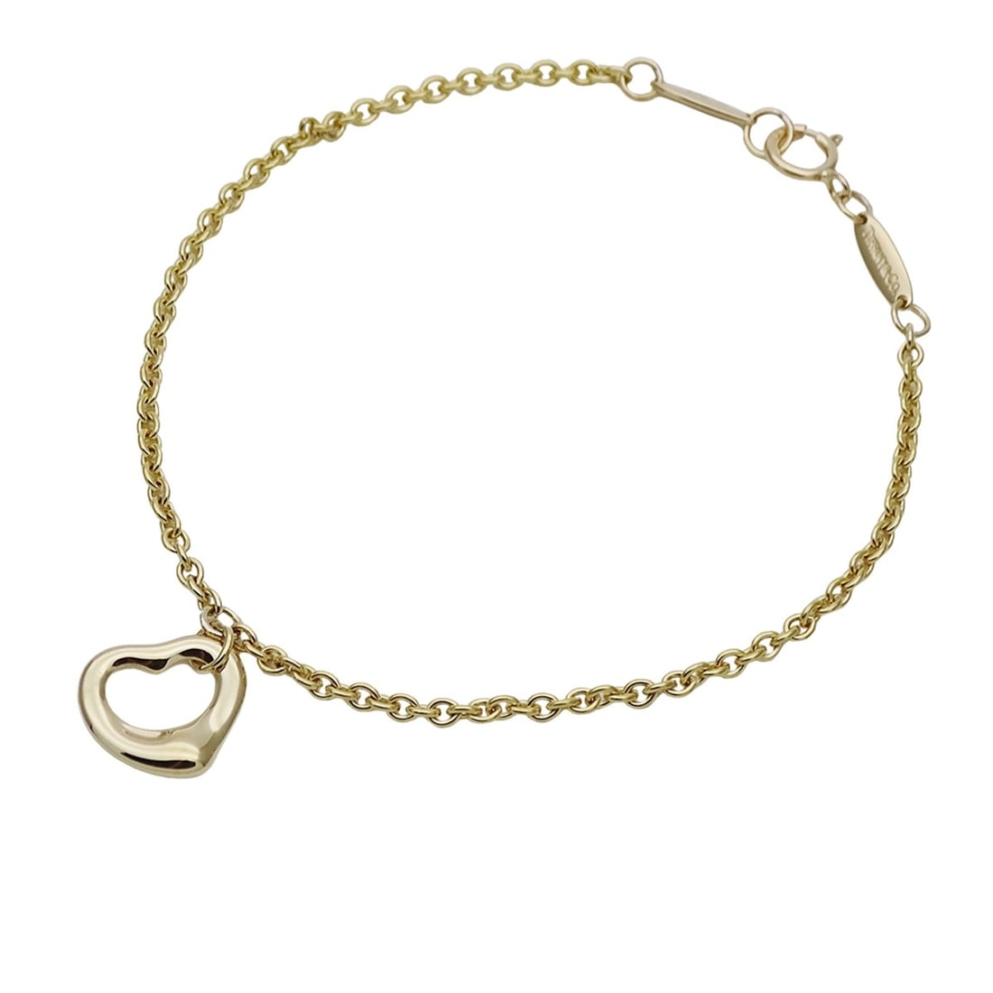 Tiffany & Co. women's bracelet, brand name, 750YG, Elsa Peretti open heart design, yellow gold: --- Catalog ---Category: SizeLength: 16.5cm / 6.49''Category: DesignType: Charm braceletColor: Yellow goldGender: WomenMaterial: Yellow gold (18K)Category: GeneralLine: Open HeartBrand: TiffanyCountry
