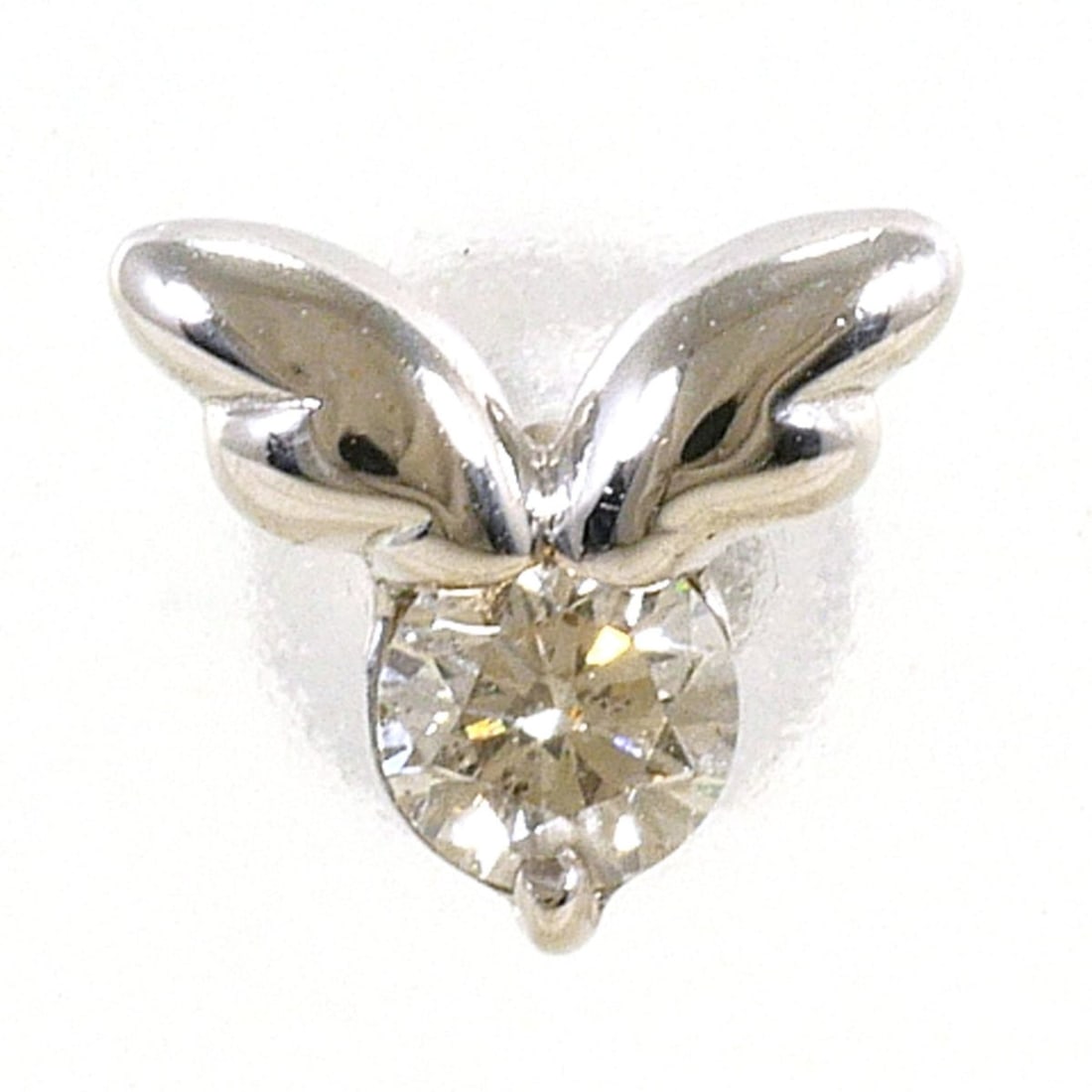 18K (18-karat white gold) single earring with 0.10ct diamond, total weight 0.3g. Jewelry.: --- Catalog ---Category: SizeWeight: 0.3g / 0.01oz.Category: DesignType: Stud earringsColor: White goldMetal: White GoldStone: DiamondGender: WomenMaterial: White gold (18K)Metal Purity: 18KWeight (ct