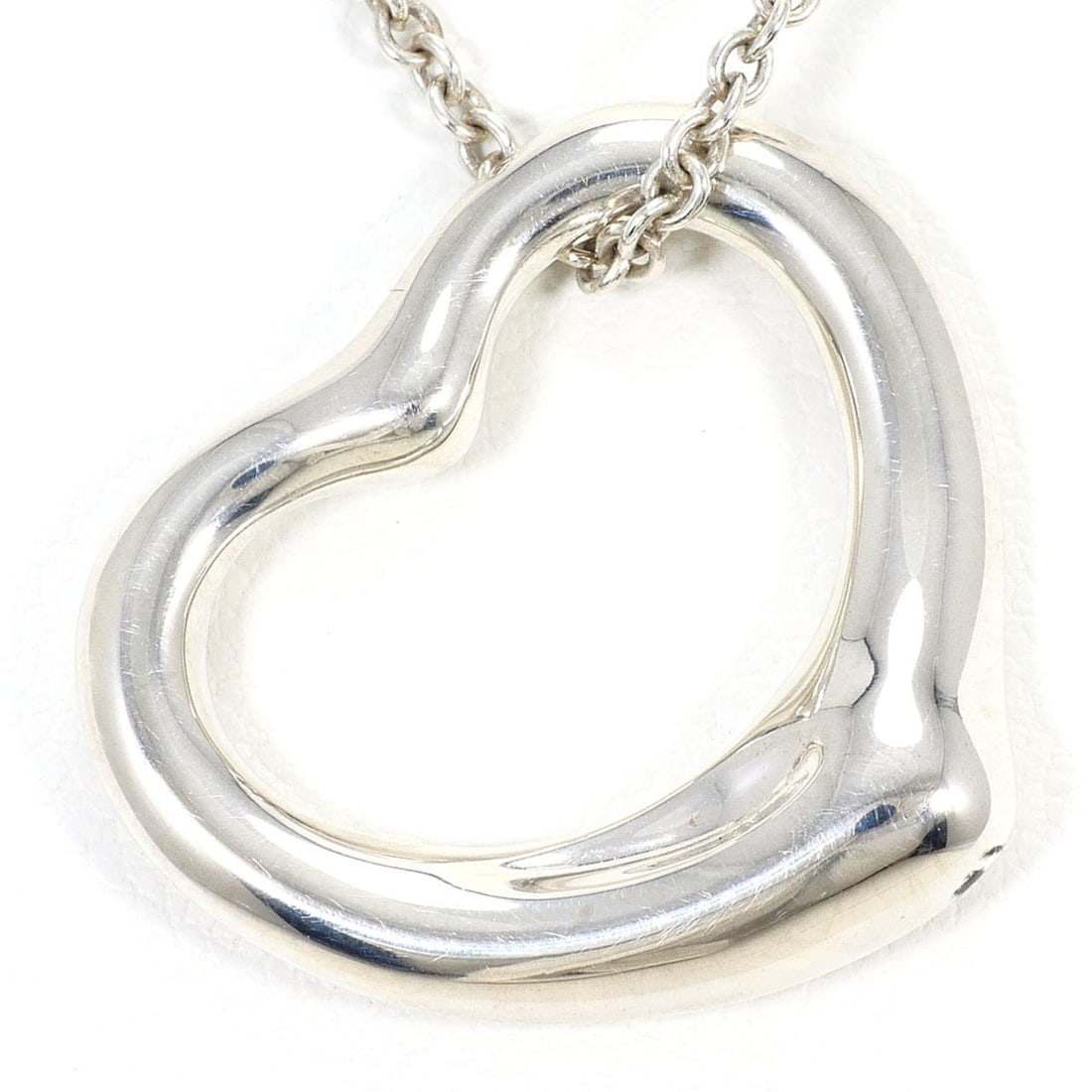 Tiffany & Co. Open Heart Silver Necklace, Total Weight 6.6g, 40cm, Jewelry: --- Catalog ---Category: SizeWeight: 6.6g / 0.23oz.Pendant Size: 19mm x 22mm / 0.74'' x 0.86''Neck Circumference: 40 cm / 15.74''Category: DesignGender: WomenMaterial: Silver 925Necklace Type: Necklac