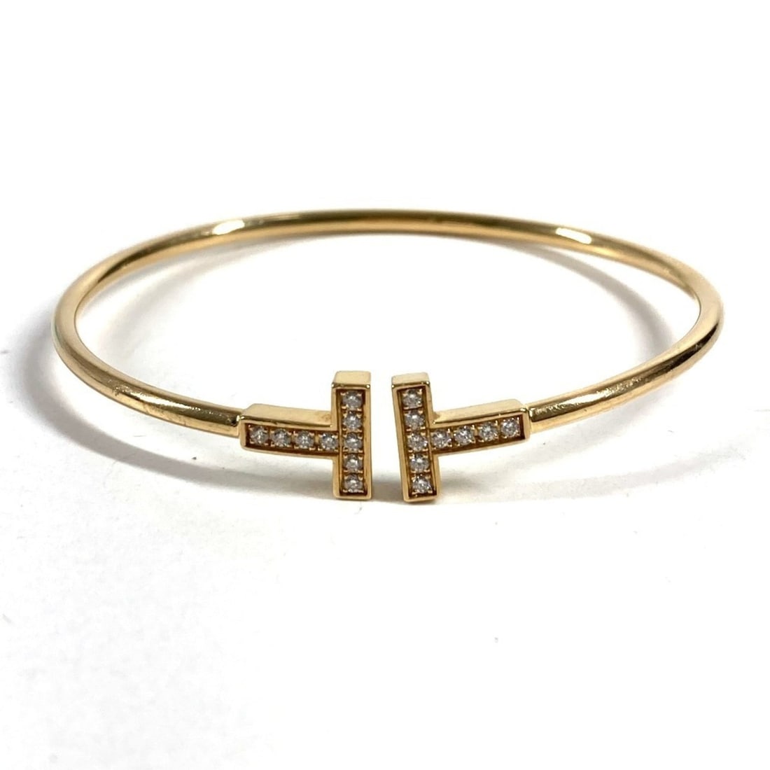 TIFFANY&Co. Tiffany & Co. 18K Gold Diamond T-Wire Bracelet Bangle YG750 Women's Accessory Jewelry: --- Catalog ---Category: SizeLength: 15.5cm / 6.1''Category: DesignType: Charm braceletColor: Yellow goldStone: DiamondGender: WomenMaterial: Yellow gold (18K)Category: GeneralBrand: Tiffany--- Item L
