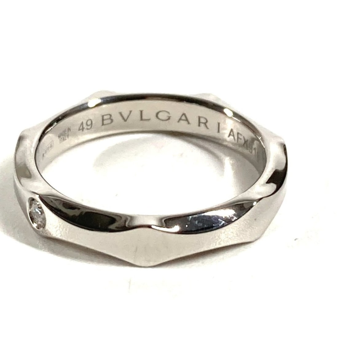 BVLGARI Platinum 1PD Diamond Infinito Wedding Band Ring - Jewelry Pt950 Women's Silver: --- Catalog ---Category: SizeWeight: 5g / 0.17oz.JP Size: 8US Size: 4.5Category: DesignType: Band ringColor: SilverStone: DiamondGender: WomenMaterial: Platinum 950Category: GeneralBrand: BvlgariCount