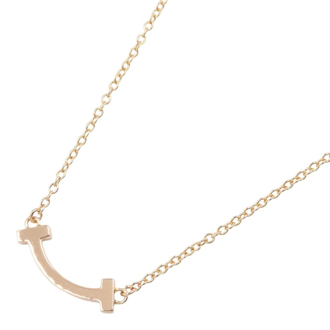 Tiffany & Co. T Smile Mini Necklace, 18K Pink Gold (PG), Women's Jewelry, Tone: --- Catalog ---Category: SizePendant Size: 3mm x 13mm / 0.11'' x 0.51''Neck Circumference: 40.5 cm - 45.5 cm / 15.94'' - 17.91''Category: DesignColor: GoldGender: WomenMaterial: Pink gold (18K)Necklac