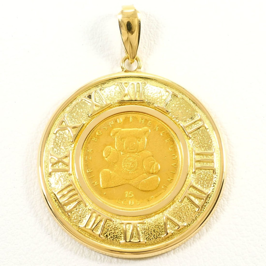 Bosnia and Herzegovina Teddy Bear Pendant Top, 15ECUS K24 (24K Yellow Gold), 18K Gold, Total Weight: --- Catalog ---Category: SizeWeight: 3.6g / 0.12oz.Pendant Size: 35mm x 25mm / 1.37'' x 0.98''Category: DesignColor: Yellow goldMetal: GoldGender: Women,MenMaterial: Yellow gold (18K), Yellow gold (24