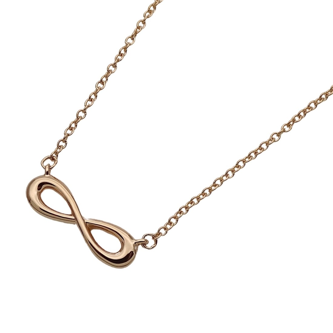 Tiffany & Co. Women's Necklace, Brand Name, 750PG Infinity ? Pink Gold Jewelry: --- Catalog ---Category: SizePendant Size: 4.2mm x 14.4mm / 0.16'' x 0.56''Neck Circumference: 40.5 cm - 46 cm / 15.94'' - 18.11''Category: DesignColor: Pink goldGender: WomenMaterial: Pink gold (18K)