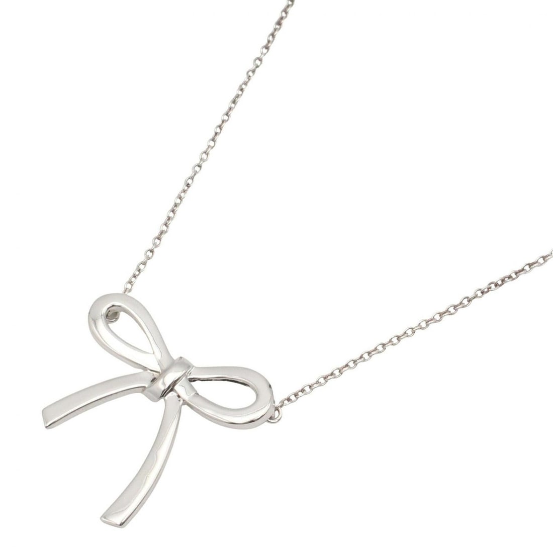 Tiffany & Co. Ribbon Necklace, Sterling Silver 925, Women's Jewelry, Tone: --- Catalog ---Category: SizePendant Size: 21.7mm x 22.4mm / 0.85'' x 0.88''Neck Circumference: 40.5 cm / 15.94''Category: DesignColor: SilverGender: WomenMaterial: Silver 925Necklace Type: NecklaceCa