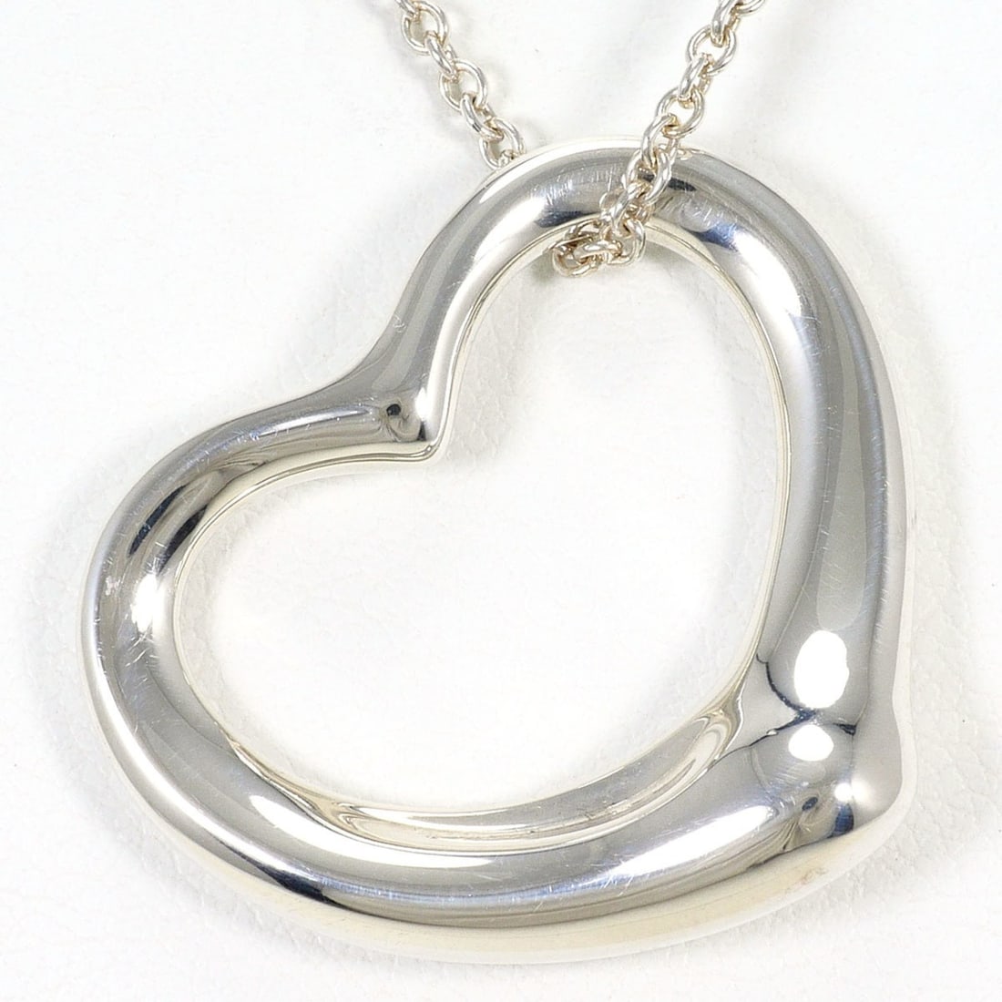 Tiffany & Co. Open Heart Silver Necklace, Total Weight 9.9g, 46cm, Jewelry: --- Catalog ---Category: SizePendant Size: 24mm x 27mm / 0.94'' x 1.06''Neck Circumference: 46 cm / 18.11''Category: DesignGender: WomenMaterial: Silver 925Necklace Type: NecklaceCategory: GeneralBran