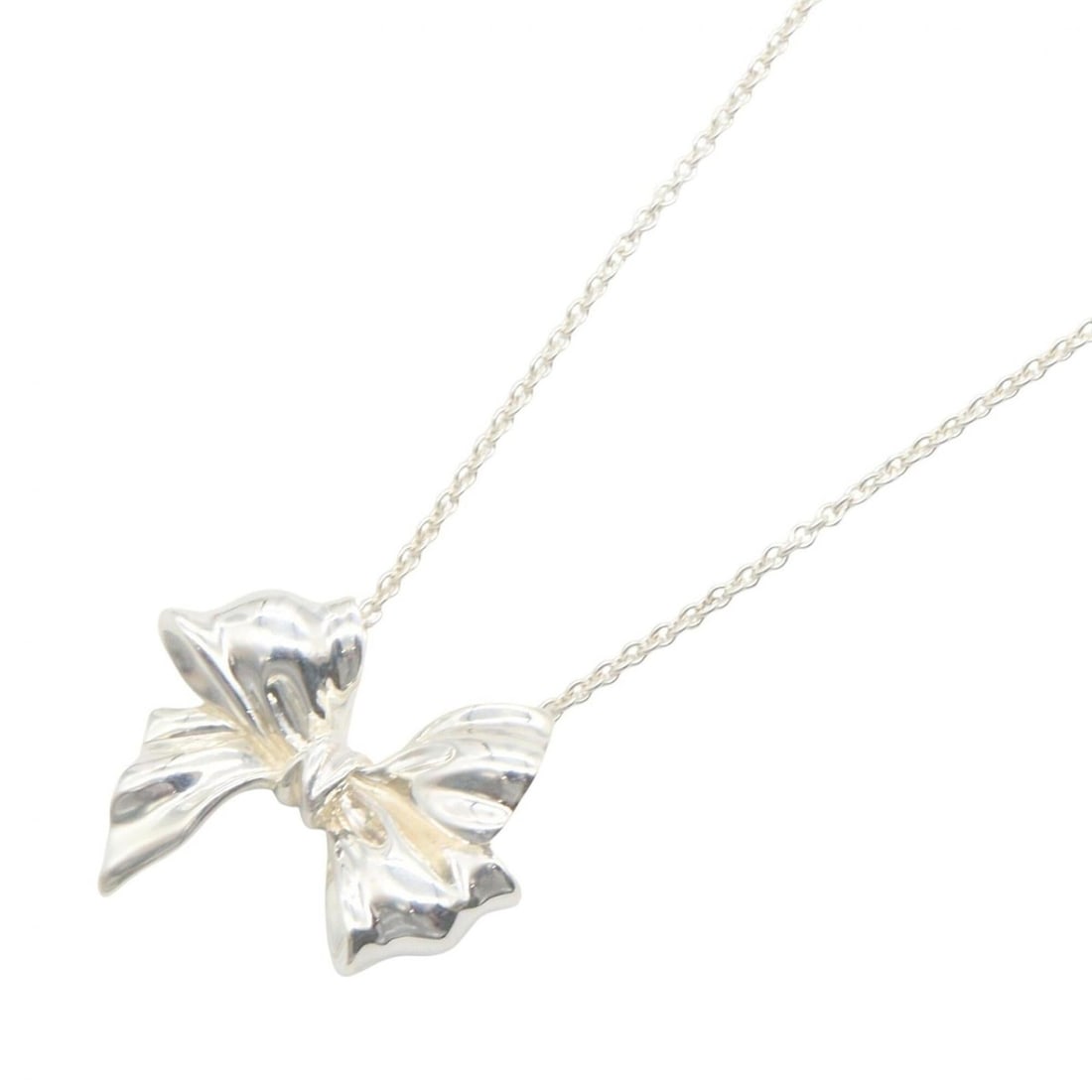Tiffany & Co. Ribbon Necklace, Sterling Silver 925, Women's Jewelry, Tone: --- Catalog ---Category: SizePendant Size: 19mm x 25mm / 0.74'' x 0.98''Neck Circumference: 46 cm / 18.11''Category: DesignColor: SilverGender: WomenMaterial: Silver 925Necklace Type: NecklaceCategory