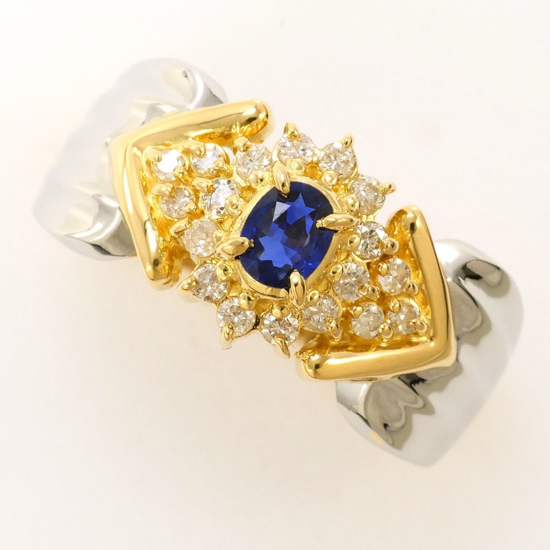 PT900 Platinum 18K Yellow Gold Ring with Sapphire and Diamond (carat weight not stamped). Total: --- Catalog ---Category: SizeWidth: 10mm / 0.39''Weight: 4.5g / 0.15oz.JP Size: 12US Size: 6.5Category: DesignType: Band ringColor: Platinum, Yellow goldMetal: Gold, PlatinumStone: Diamond, SapphireGe