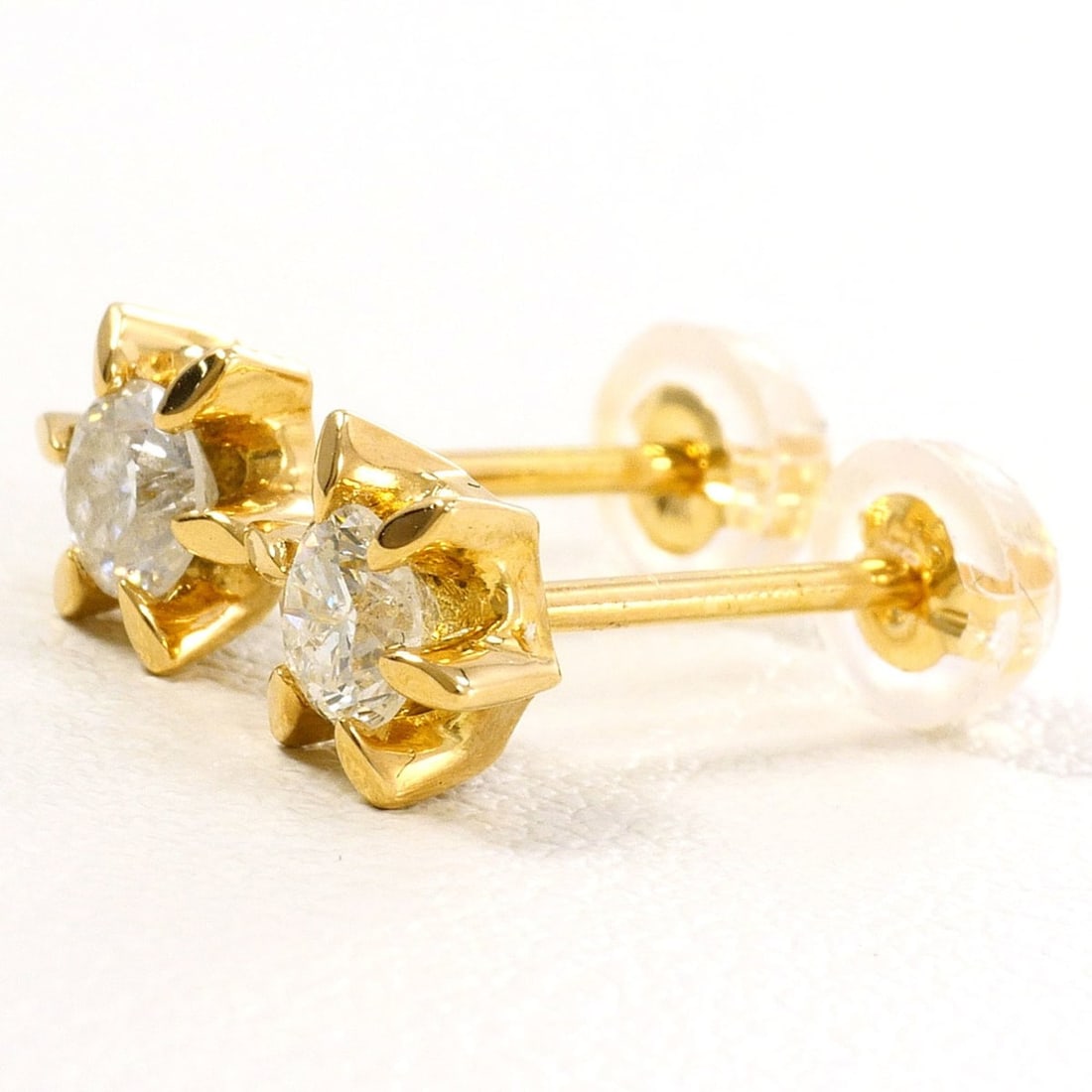 18K (18-karat) Yellow Gold (YG) Earrings with 0.22ct Diamonds, Certificate of Authenticity, Total: --- Catalog ---Category: SizeWeight: 1.2g / 0.04oz.Category: DesignType: Stud earringsColor: Yellow goldMetal: GoldStone: DiamondGender: WomenMaterial: Yellow gold (18K)Metal Purity: 18KWeight (ct.): 
