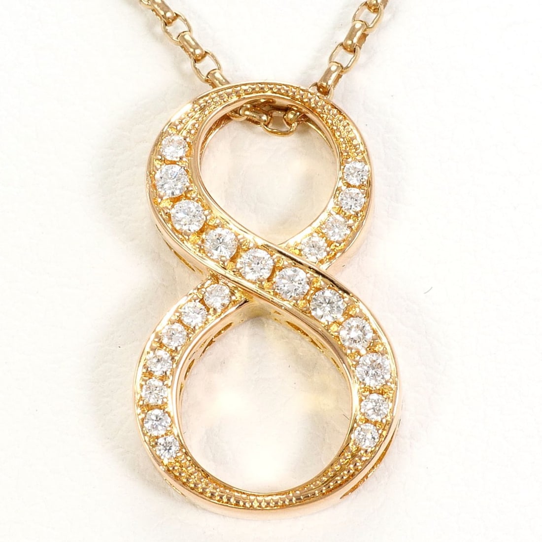 18K (18-karat gold) Pink Gold Necklace with 0.15ct Diamond, Certificate of Authenticity, Total: --- Catalog ---Category: SizeWeight: 4.5g / 0.15oz.Pendant Size: 18mm x 11mm / 0.7'' x 0.43''Neck Circumference: 40 cm / 15.74''Category: DesignColor: Pink goldMetal: GoldStone: DiamondGender: WomenMa