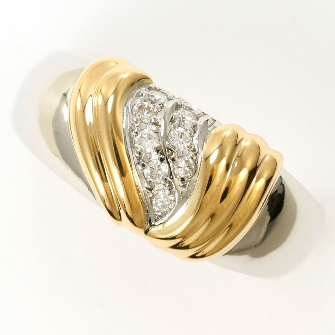 PT900 Platinum 18K Yellow Gold Ring with 0.09 ct Diamond, Certificate of Authenticity, Total Weight: --- Catalog ---Category: SizeWeight: 7.4g / 0.26oz.JP Size: 14US Size: 7Category: DesignType: Band ringColor: Platinum, Yellow goldMetal: Gold, PlatinumStone: DiamondGender: WomenMaterial: Platinum 90