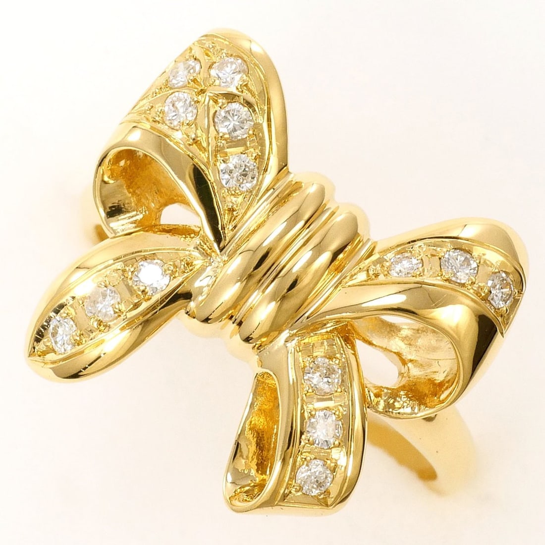 18K (18-karat) Yellow Gold Ring with 0.15 ct Diamond, Certificate of Authenticity, Total Weight: --- Catalog ---Category: SizeWeight: 4.2g / 0.14oz.JP Size: 7.5US Size: 4Category: DesignType: Band ringColor: YellowMetal: GoldStone: DiamondGender: WomenMaterial: Yellow gold (18K)Metal Purity: 18KW