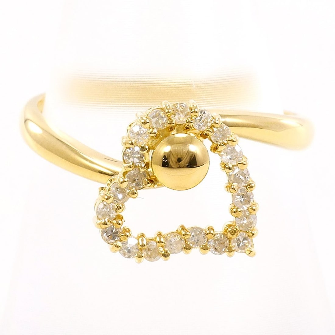 18K (18-karat) Yellow Gold Ring with 0.19ct Diamond, Certificate of Authenticity, Total Weight 2.7g,: --- Catalog ---Category: SizeWeight: 2.7g / 0.09oz.JP Size: 11US Size: 6Category: DesignType: Band ringColor: Yellow goldMetal: GoldStone: DiamondGender: WomenMaterial: Yellow gold (18K)Metal Purity: 