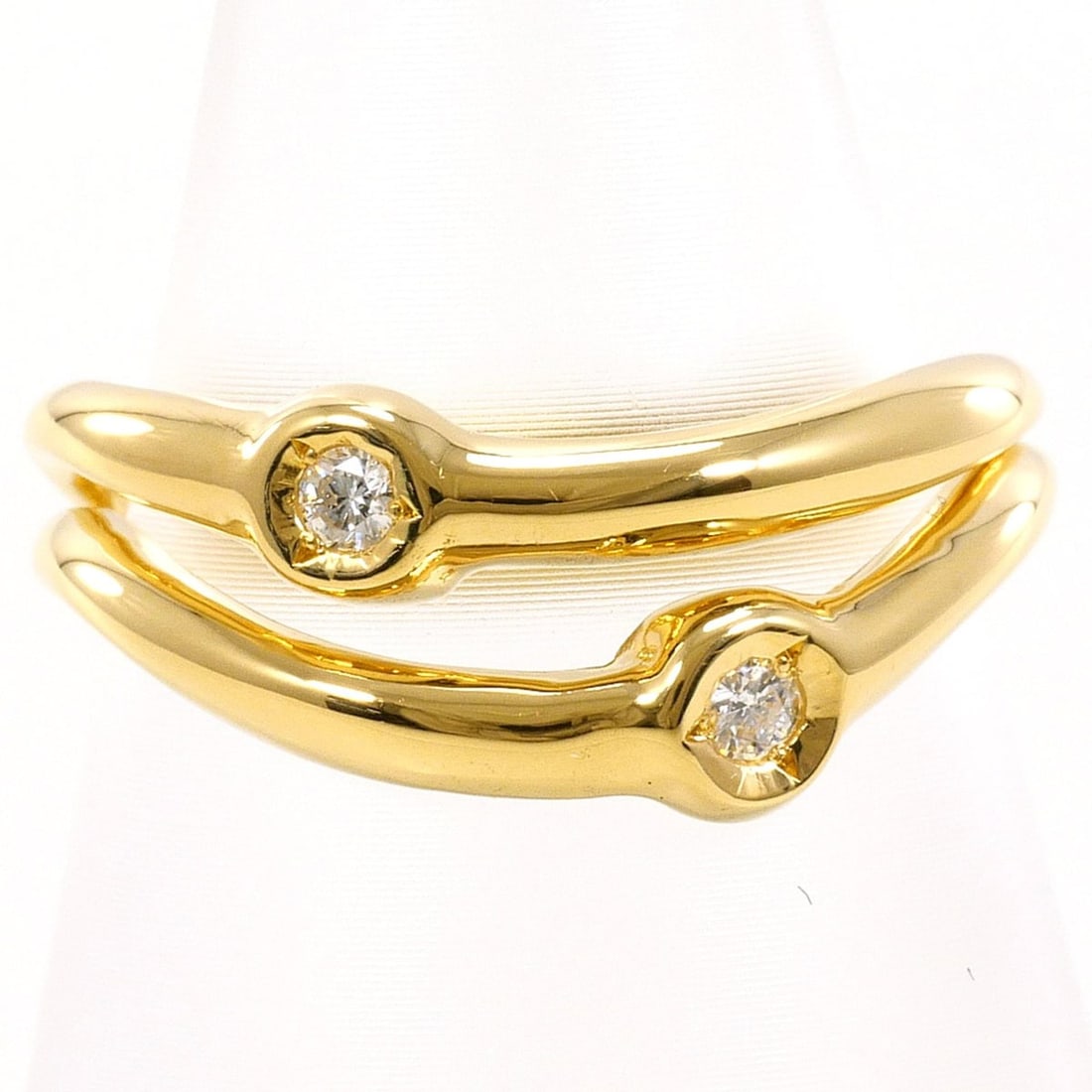 18K (18-karat) Yellow Gold Ring with Diamond (carat mark not specified), Certificate of: --- Catalog ---Category: SizeWeight: 4g / 0.14oz.JP Size: 10.5US Size: 5.5Category: DesignType: Band ringColor: Yellow goldMetal: GoldStone: DiamondGender: WomenMaterial: Yellow gold (18K)Metal Purity