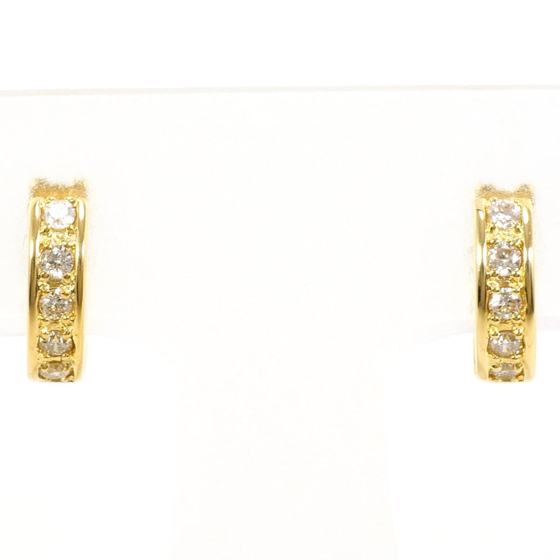 18K (18-karat) Yellow Gold Earrings with 0.09ct Diamonds, Total Weight 2.2g, Jewelry: --- Catalog ---Category: SizeWeight: 2.2g / 0.07oz.Category: DesignType: Hoop earringsColor: Yellow goldMetal: GoldStone: DiamondGender: WomenMaterial: Yellow gold (18K)Metal Purity: 18KWeight (ct.): 