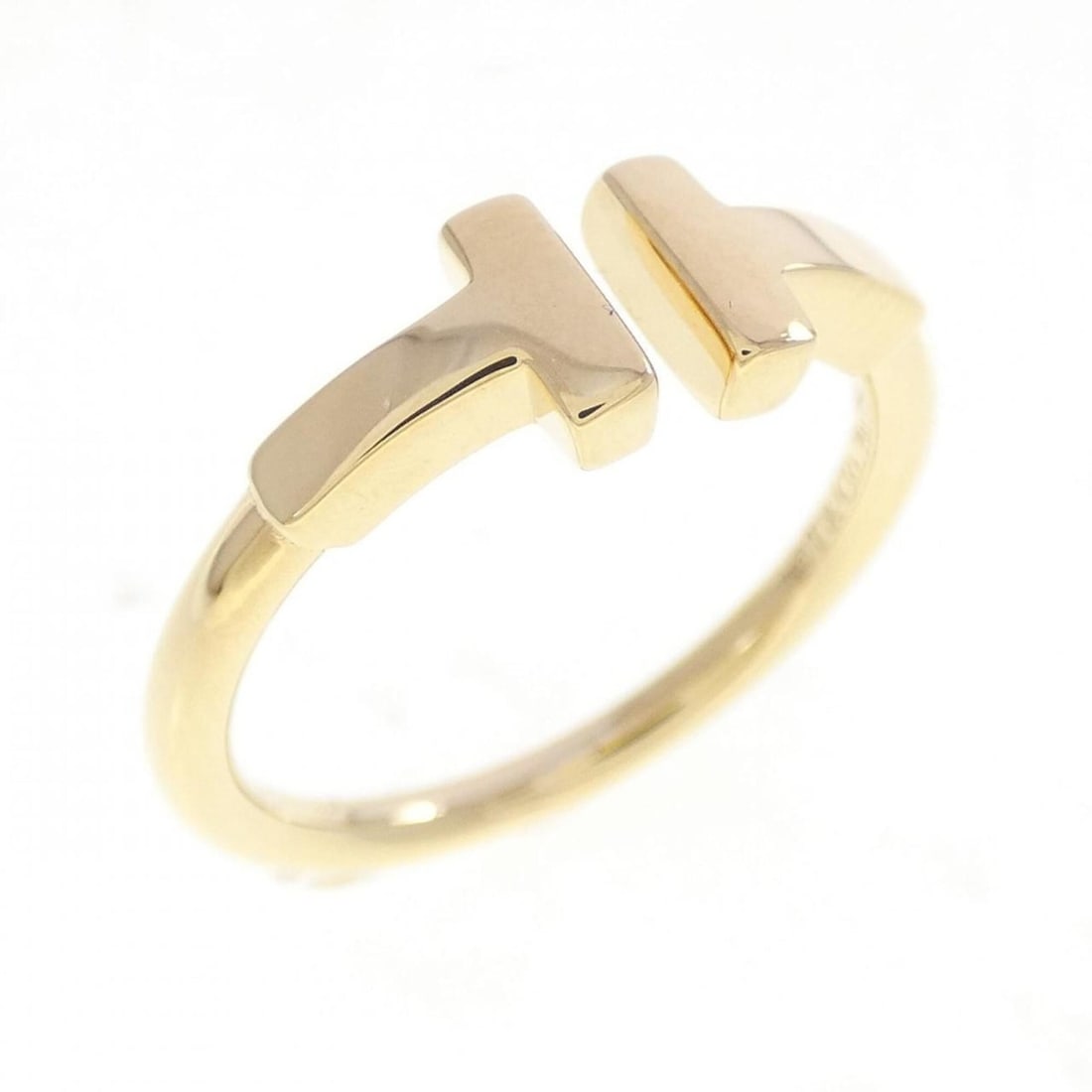 Tiffany T Wire Ring: --- Catalog ---Category: SizeJP Size: 9US Size: 5Category: DesignType: Band ringGender: WomenMaterial: Yellow gold (18K)Category: GeneralBrand: Tiffany--- Item List ---Section: ConditionRanking: Rank