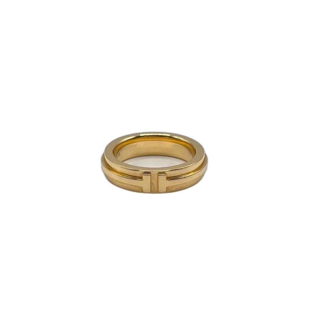 Tiffany & Co. T Narrow Ring (Gold): --- Catalog ---Category: DesignType: Band ringColor: GoldGender: Women,Men,UnisexCategory: GeneralBrand: Tiffany--- Item List ---Section: ConditionRanking: Rank AB Used - Traces of usage, scratches / 
