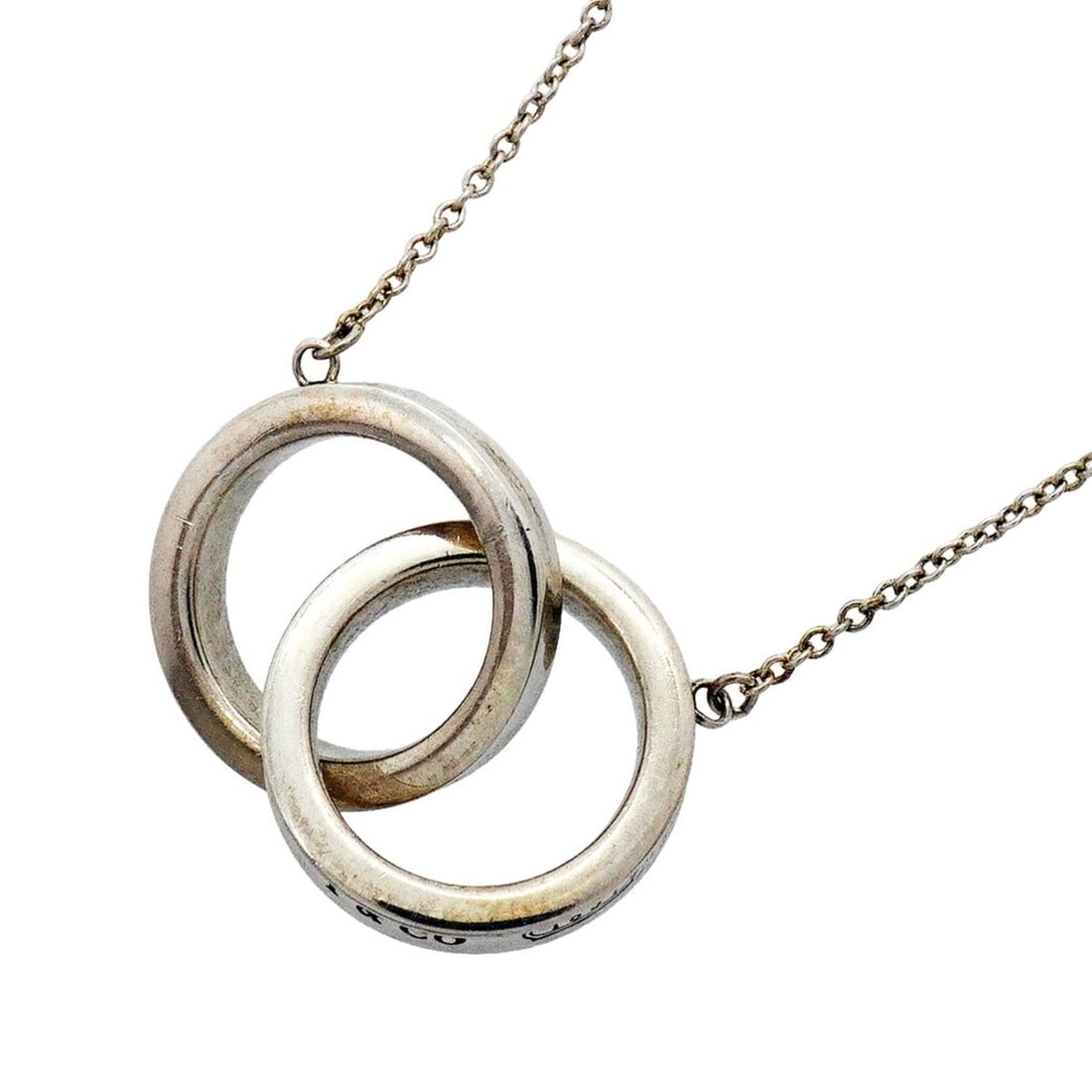 Tiffany & Co. 1837 Interlocking Necklace, Sterling Silver 925, Women's: --- Catalog ---Category: SizePendant Size: 14.2mm x 22mm / 0.55'' x 0.86''Neck Circumference: 40.5 cm / 15.94''Category: DesignGender: WomenMaterial: Silver 925Necklace Type: NecklaceCategory: General