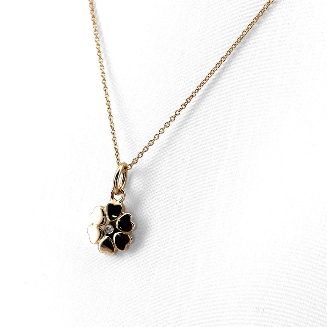 Tiffany & Co. Flower Motif Pink Gold Pendant Necklace with Small Diamonds (750) - Women's: --- Catalog ---Category: SizePendant Size: 18.4mm x 10.1mm / 0.72'' x 0.39''Neck Circumference: 40.5 cm / 15.94''Category: DesignStone: DiamondGender: WomenMaterial: Pink gold (18K)Necklace Type: Neck