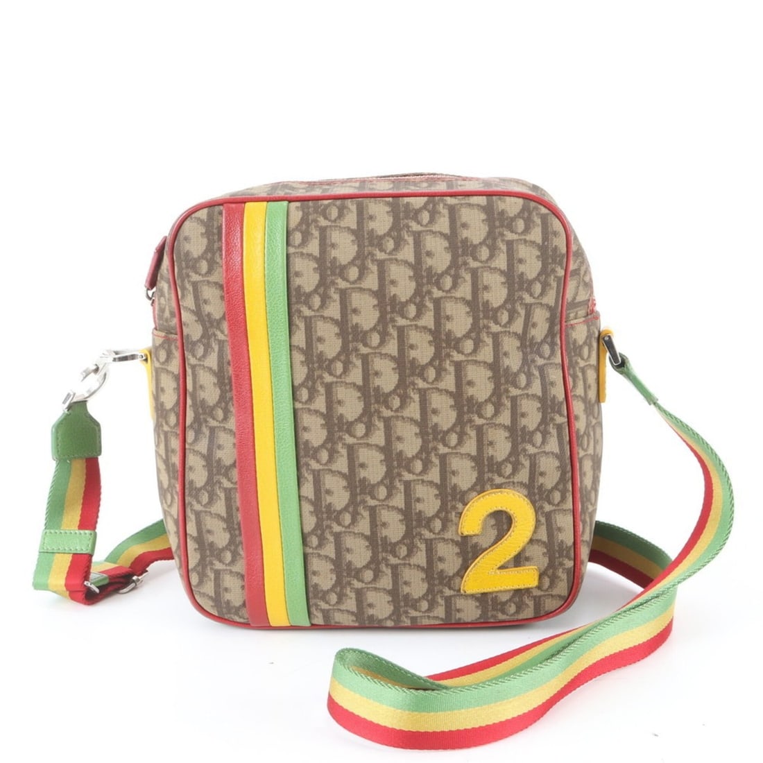 Christian Dior Trotter Rasta Number 2 01 MA 0044 Leather Shoulder Bag for Men: --- Catalog ---Category: SizeSize (HxWxD): 23cm x 22cm x 9cm / 9.05'' x 8.66'' x 3.54''Category: DesignType: Shoulder bagColor: Brown, Multi-colorGender: MenMaterial: Leather , Coated canvas Category: