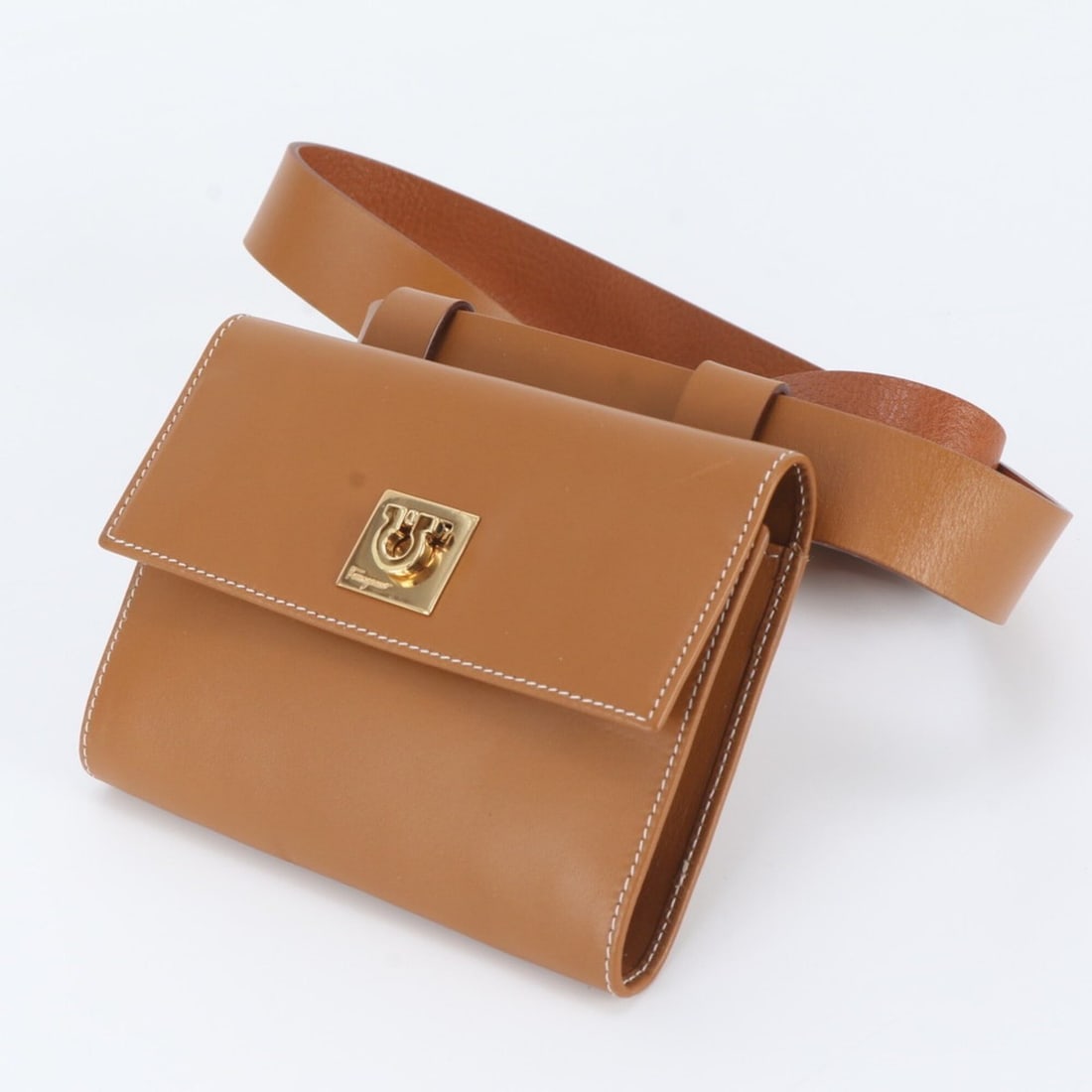 Salvatore Ferragamo Gancini Leather Waist Bag, Pouch, Body Shoulder Bag for Men: --- Catalog ---Category: SizeSize (HxWxD): 10cm x 13cm x 1cm / 3.93'' x 5.11'' x 0.39''Category: DesignType: Pouch, Shoulder bag, Sling bagColor: BrownGender: MenMaterial: Leather Category: GeneralBra