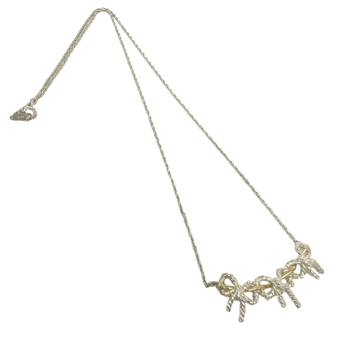 TIFFANY&Co. Tiffany Vintage Triple Ribbon Necklace, Sterling Silver 925, 18K 750YG, Accessory,: --- Catalog ---Category: SizePendant Size: 15mm x 30mm / 0.59'' x 1.18''Neck Circumference: 49.2 cm / 19.37''Category: DesignColor: Gold, SilverGender: WomenMaterial: Silver 925, Yellow gold (18K)Neck