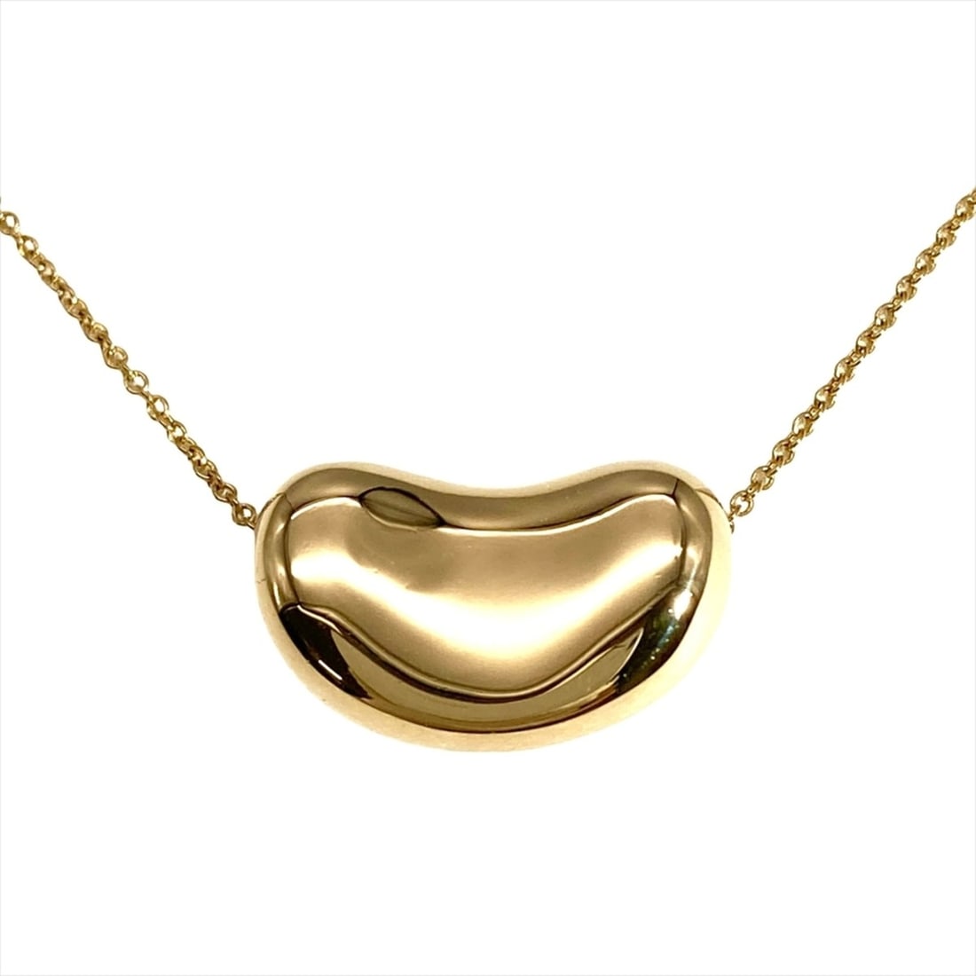 Tiffany & Co. Bean Design Necklace, 18K Yellow Gold, 8.6g, Women's.: --- Catalog ---Category: SizeWeight: 8.6g / 0.3oz.Pendant Size: 12mm x 20mm / 0.47'' x 0.78''Neck Circumference: 46 cm / 18.11''Category: DesignGender: WomenMaterial: Yellow gold (18K)Necklace Type: N