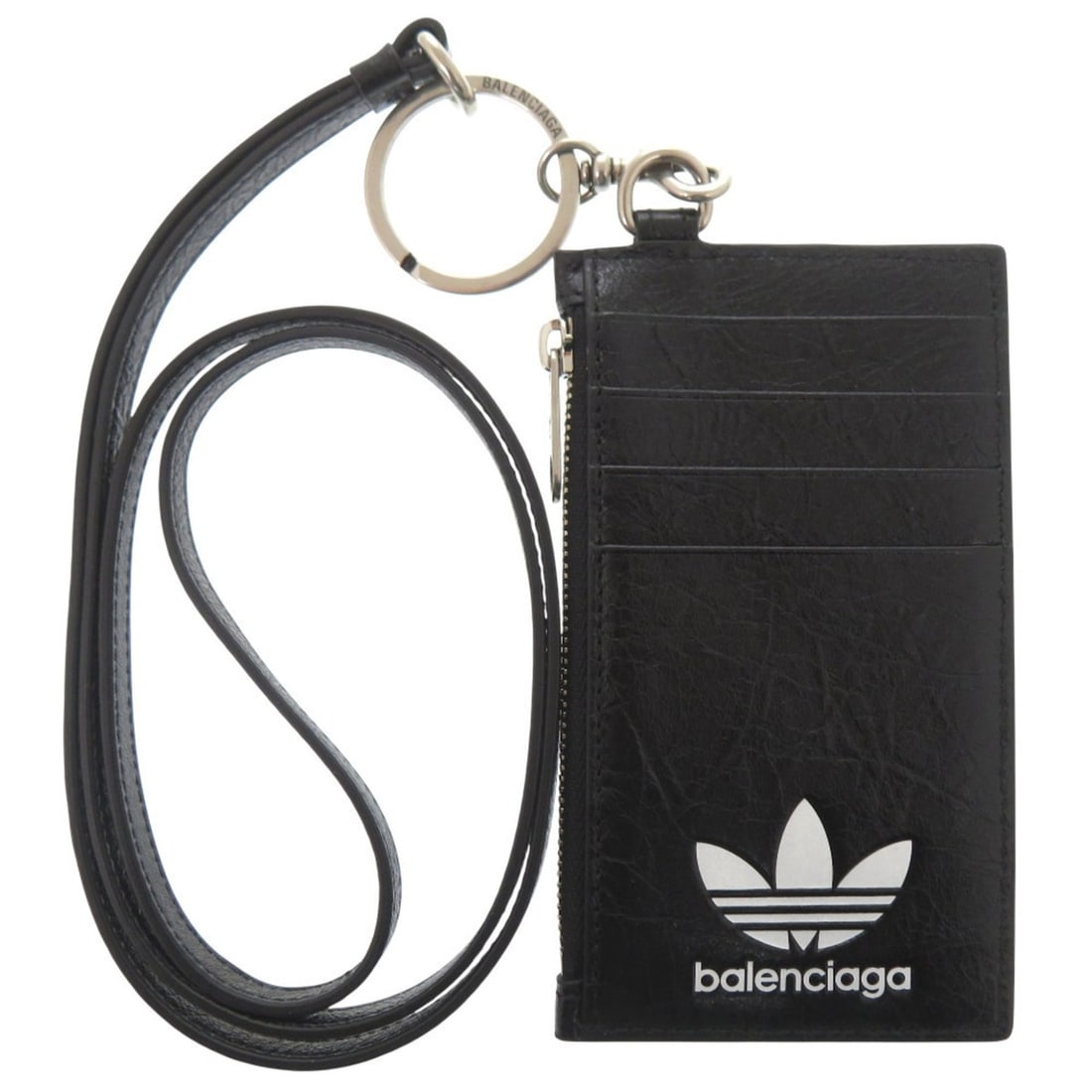 Balenciaga x Adidas Collaboration Trefoil 721894 Leather Black Shoulder Wallet (Black) 1288: --- Catalog ---Category: SizeSize (HxWxD): 7.5cm x 13cm / 2.95'' x 5.11''Category: DesignType: Shoulder bagColor: Black, WhiteGender: Men,WomenMaterial: Leather Category: GeneralMPN: 721894Brand: Bale