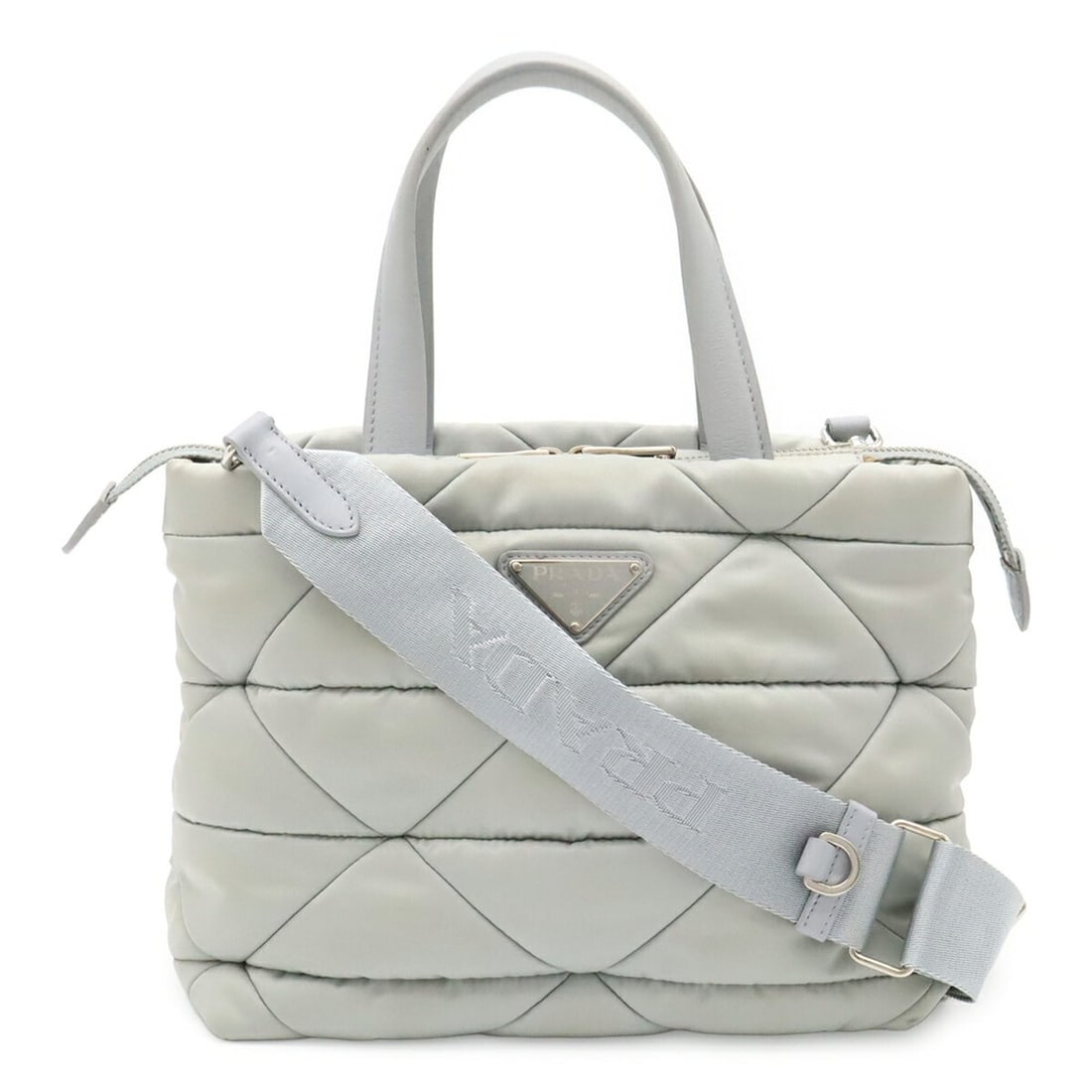 PRADA Small Padded Tote Bag, Handbag, Shoulder Nylon OPALINE Blue, Handbag (Pouch missing), 1BG373: --- Catalog ---Category: SizeSize (HxWxD): 19.5cm x 23cm x 13cm / 7.67'' x 9.05'' x 5.11''Category: DesignType: Handbag, Pouch, Shoulder bag, Tote bagColor: BlueGender: WomenMaterial: Nylon Category: 