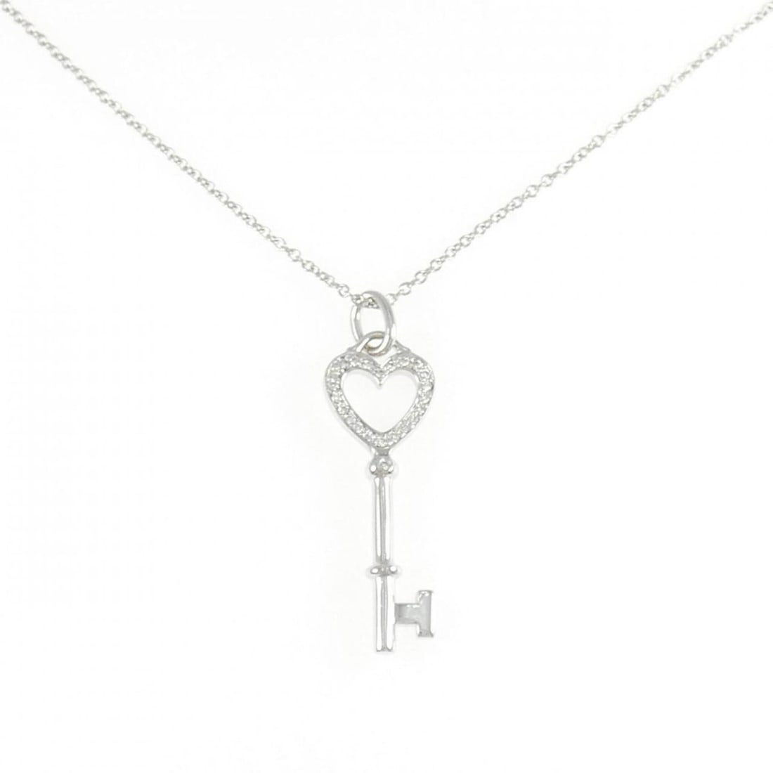 Tiffany Heart Key Mini Necklace: --- Catalog ---Category: SizePendant Size: 30.6mm x 9.1mm / 1.2'' x 0.35''Neck Circumference: 40 cm / 15.74''Category: DesignGender: WomenMaterial: White gold (18K)Pendant Type: PendantNecklace Type: