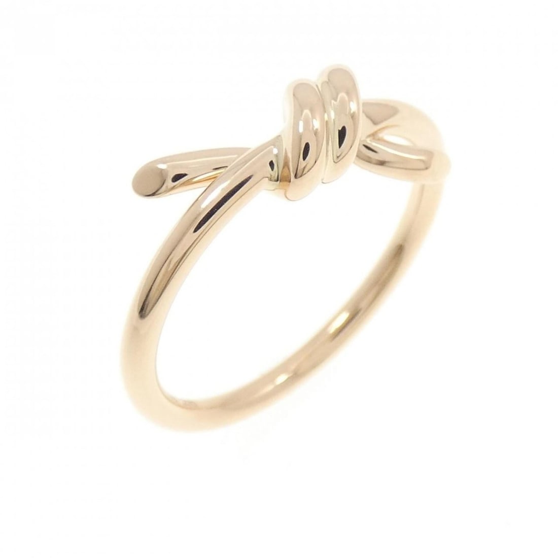 Tiffany Knot Ring: --- Catalog ---Category: SizeJP Size: 10US Size: 5.5Category: DesignType: Band ringGender: WomenMaterial: Pink gold (18K)Category: GeneralBrand: Tiffany--- Item List ---Section: ConditionRanking: Rank
