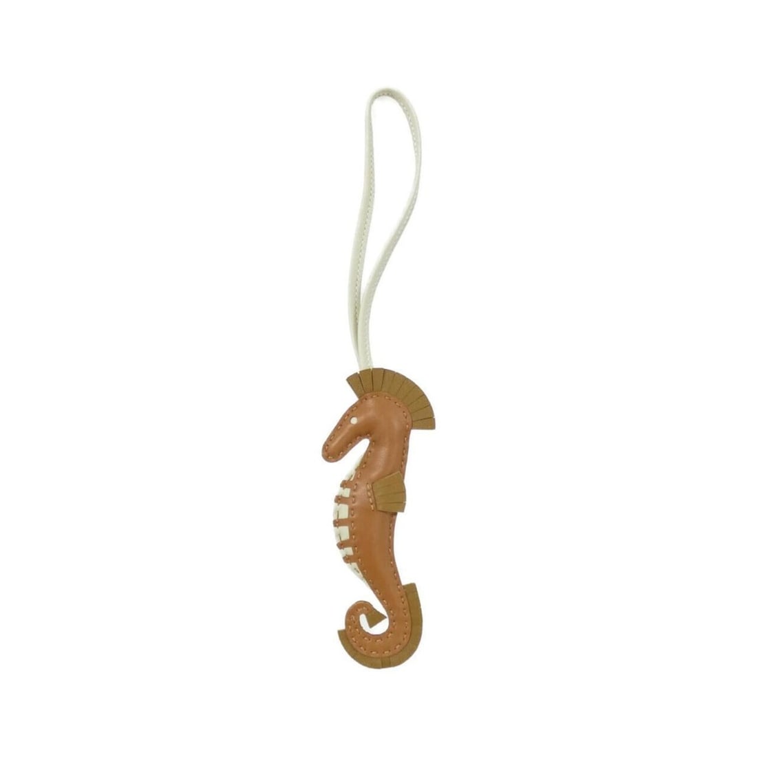 Hermes Hippo 084738CA Accessory Bag Charm: --- Catalog ---Category: SizeChain Length: 260.00mm / 10.24''Size (HxWxD): 130.00mm x 50.00mm / 5.12'' x 1.97''Category: DesignType: Handbag charmColor: KraftGender: Women,MenMaterial: Agneau