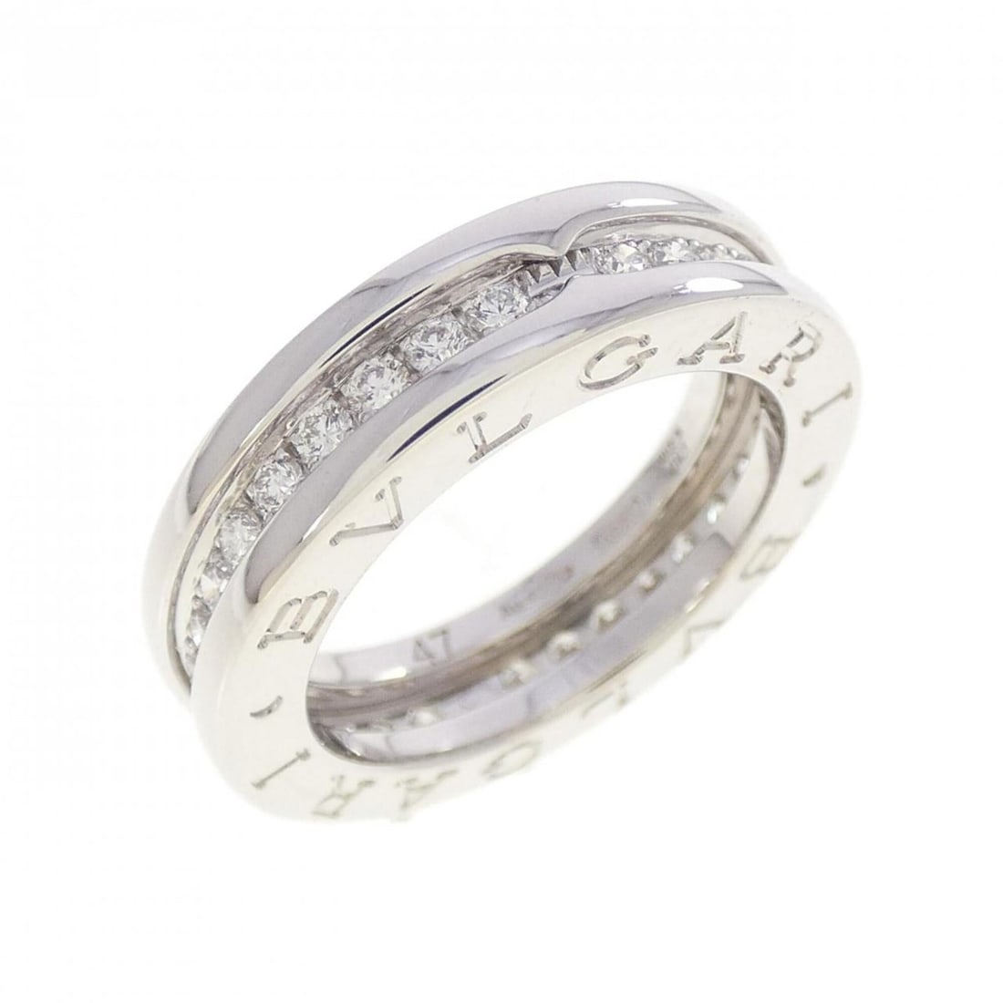 Bvlgari B.zero1 1-band ring: --- Catalog ---Category: SizeUS Size: 4Brand Size: 47Category: DesignType: Band ringStone: DiamondGender: WomenMaterial: White gold (18K)Category: GeneralBrand: Bvlgari--- Item List ---Section: