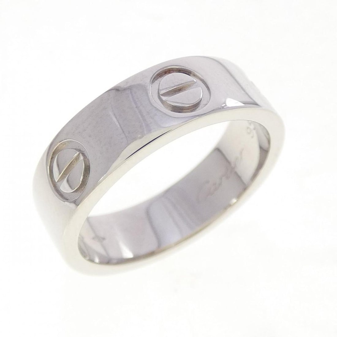 Cartier Love Ring: --- Catalog ---Category: SizeUS Size: 4.5Brand Size: 48Category: DesignType: Band ringGender: WomenMaterial: Platinum 950Category: GeneralMPN: B4084900Brand: Cartier--- Item List ---Section: Condition