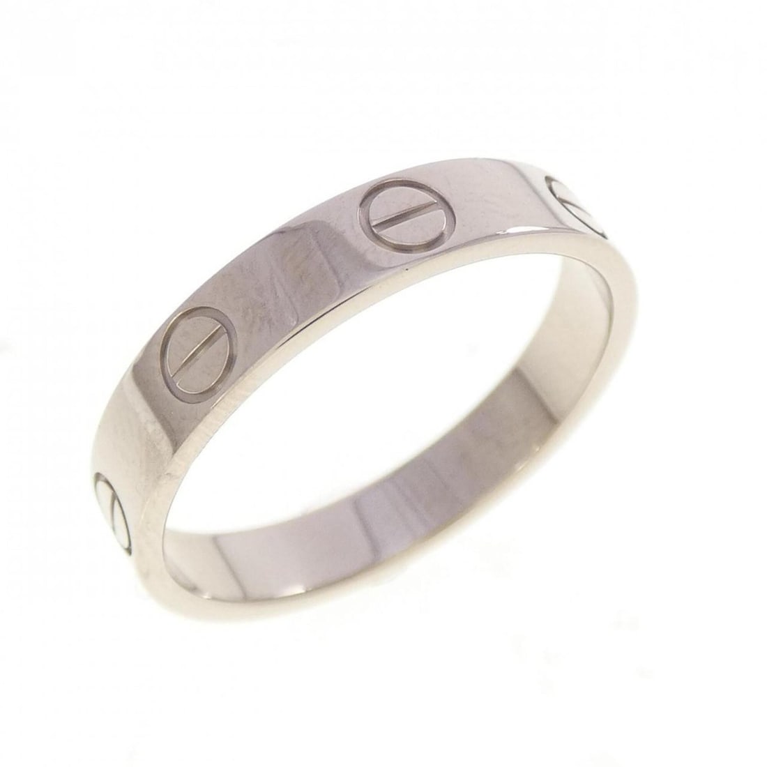 Cartier Mini Love Ring: --- Catalog ---Category: SizeUS Size: 7Brand Size: 54Category: DesignType: Band ringGender: WomenMaterial: White gold (18K)Category: GeneralMPN: B4085100Brand: Cartier--- Item List ---Section: Conditi