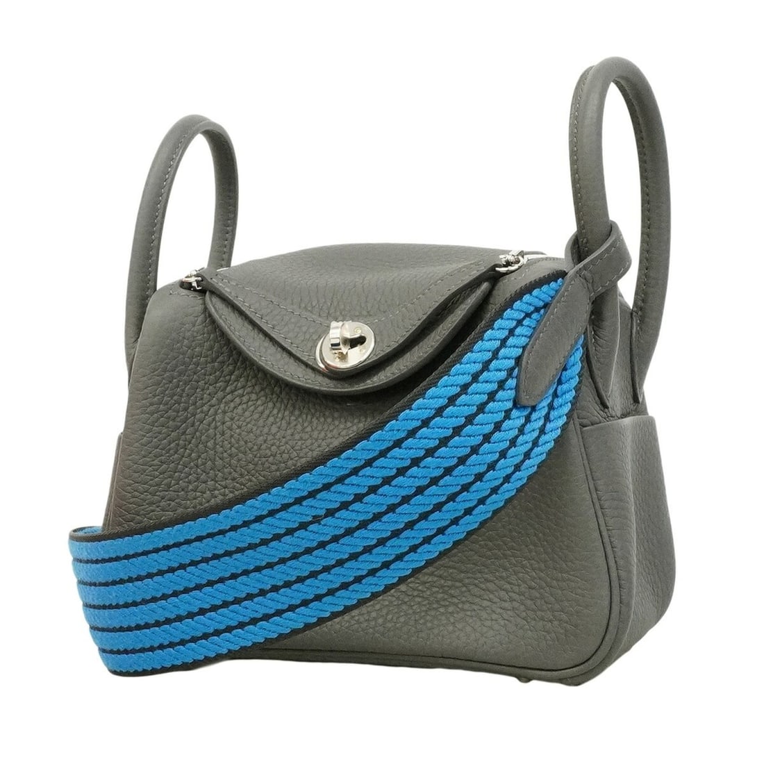 Hermes Lindy Mini handbag, Taurillon Clemence leather, Ardoise color, G stamp, 2-way bag for women,: --- Catalog ---Category: SizeSize (HxWxD): 13cm x 18cm x 9.5cm / 5.11'' x 7.08'' x 3.74''Category: DesignType: HandbagColor: ArdoiseGender: WomenMaterial: Taurillon clemence leather Hardware Color: Si