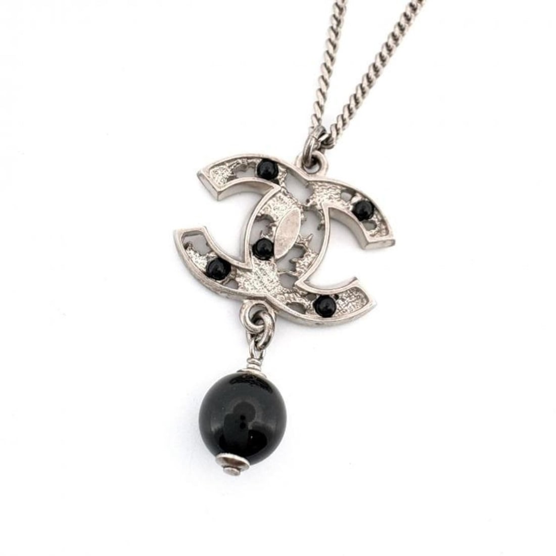 Chanel 08P Coco Mark Necklace Black Stone Silver CHANEL: --- Catalog ---Category: SizePendant Size: 36mm x 23mm / 1.41'' x 0.9''Neck Circumference: 44 cm - 49.5 cm / 17.32'' - 19.48''Category: DesignColor: Black, SilverGender: WomenMaterial: MetalNecklace T
